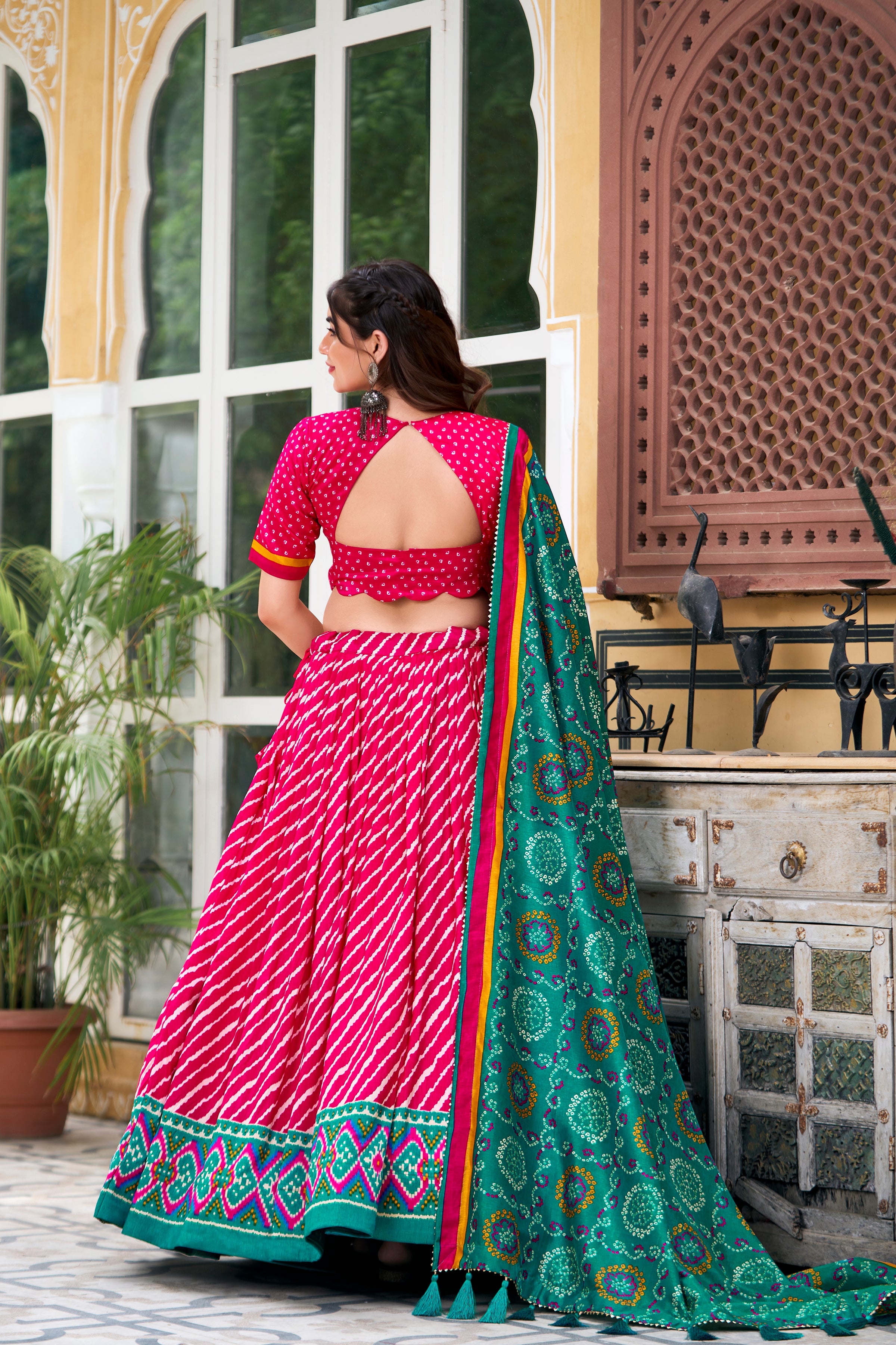 Vibrant Pink Bandhej Lehenga with Contrast Teal Dupatta