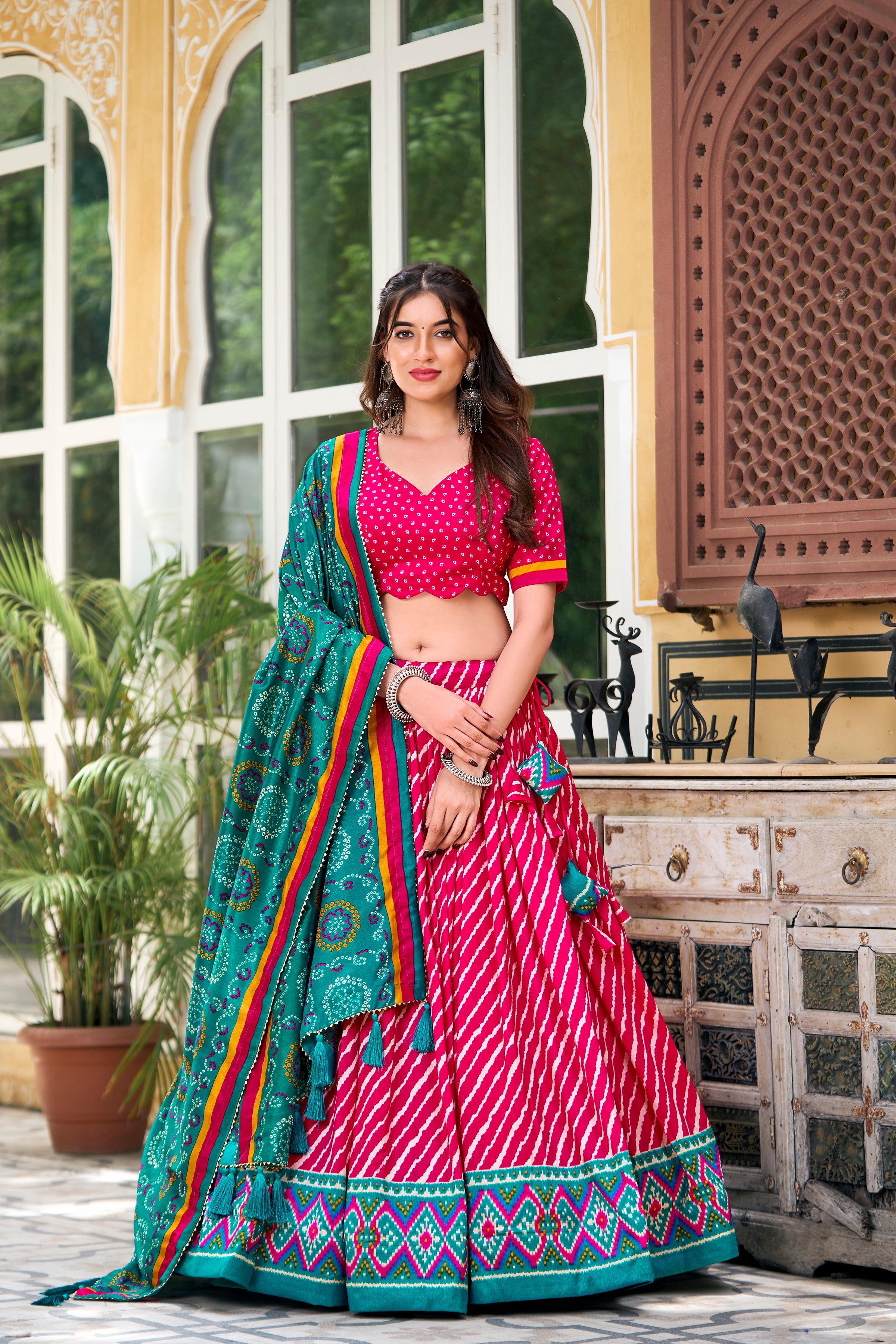 Vibrant Pink Bandhej Lehenga with Contrast Teal Dupatta