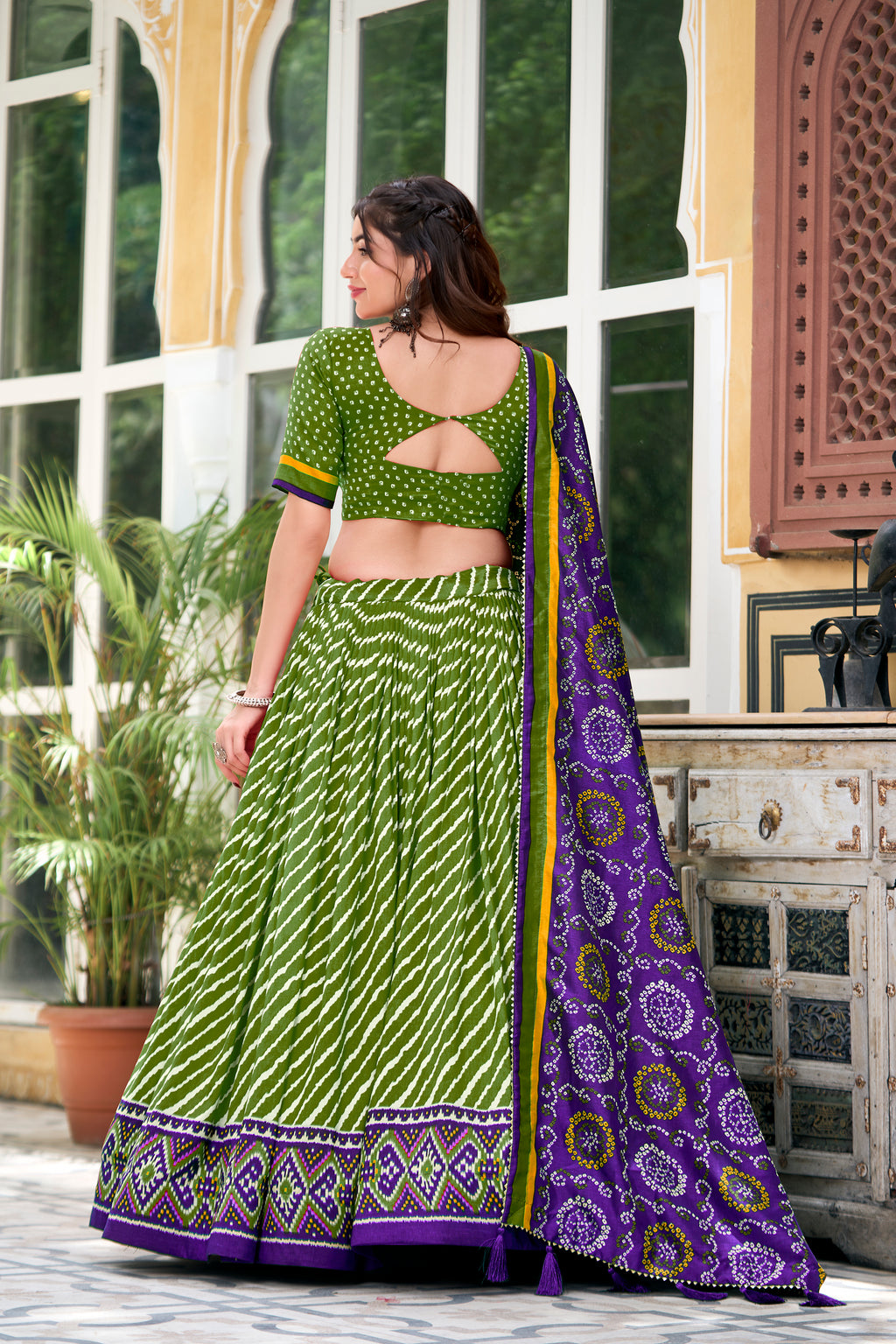 Vibrant Pink Bandhej Lehenga with Contrast Teal Dupatta