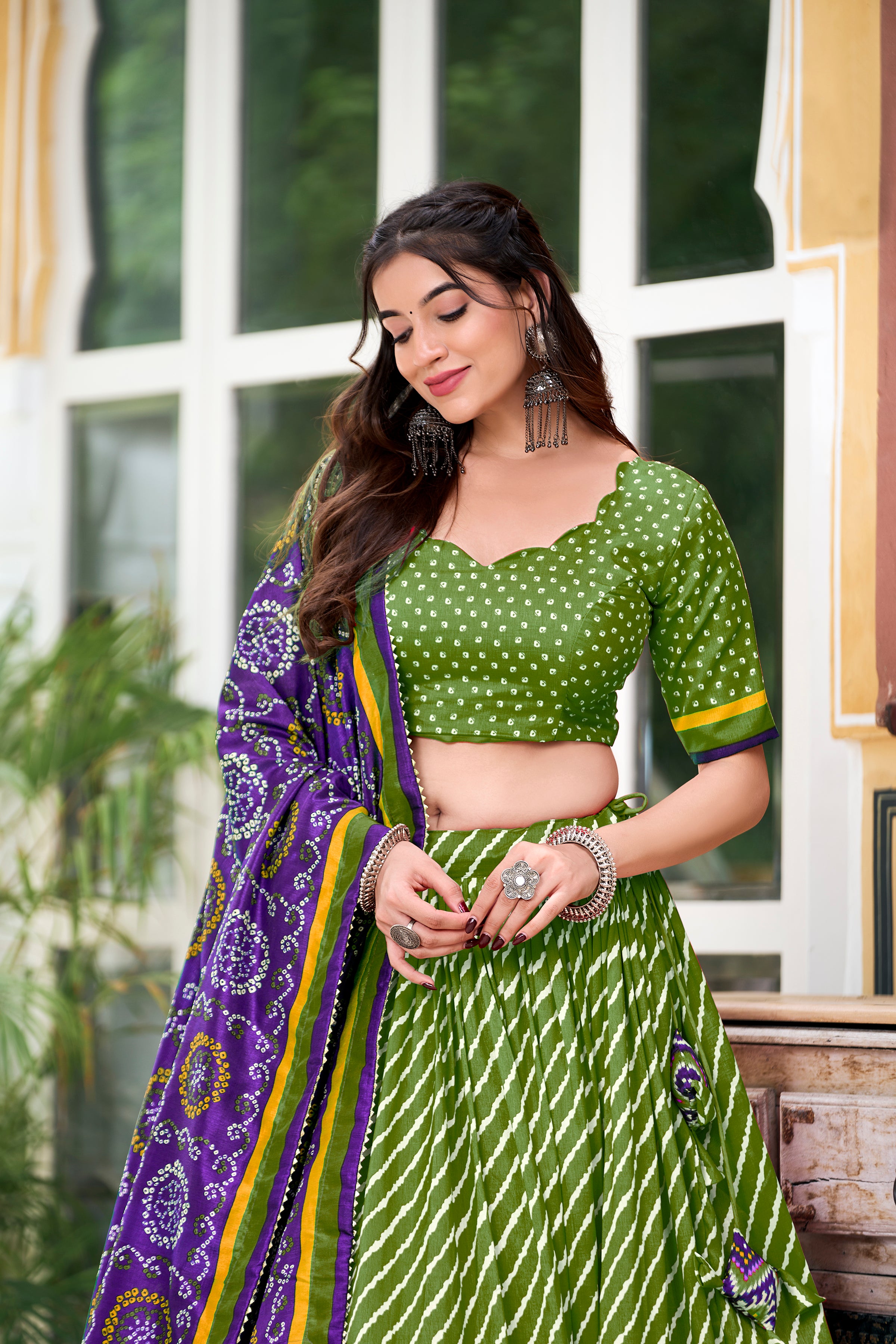 Vibrant Pink Bandhej Lehenga with Contrast Teal Dupatta