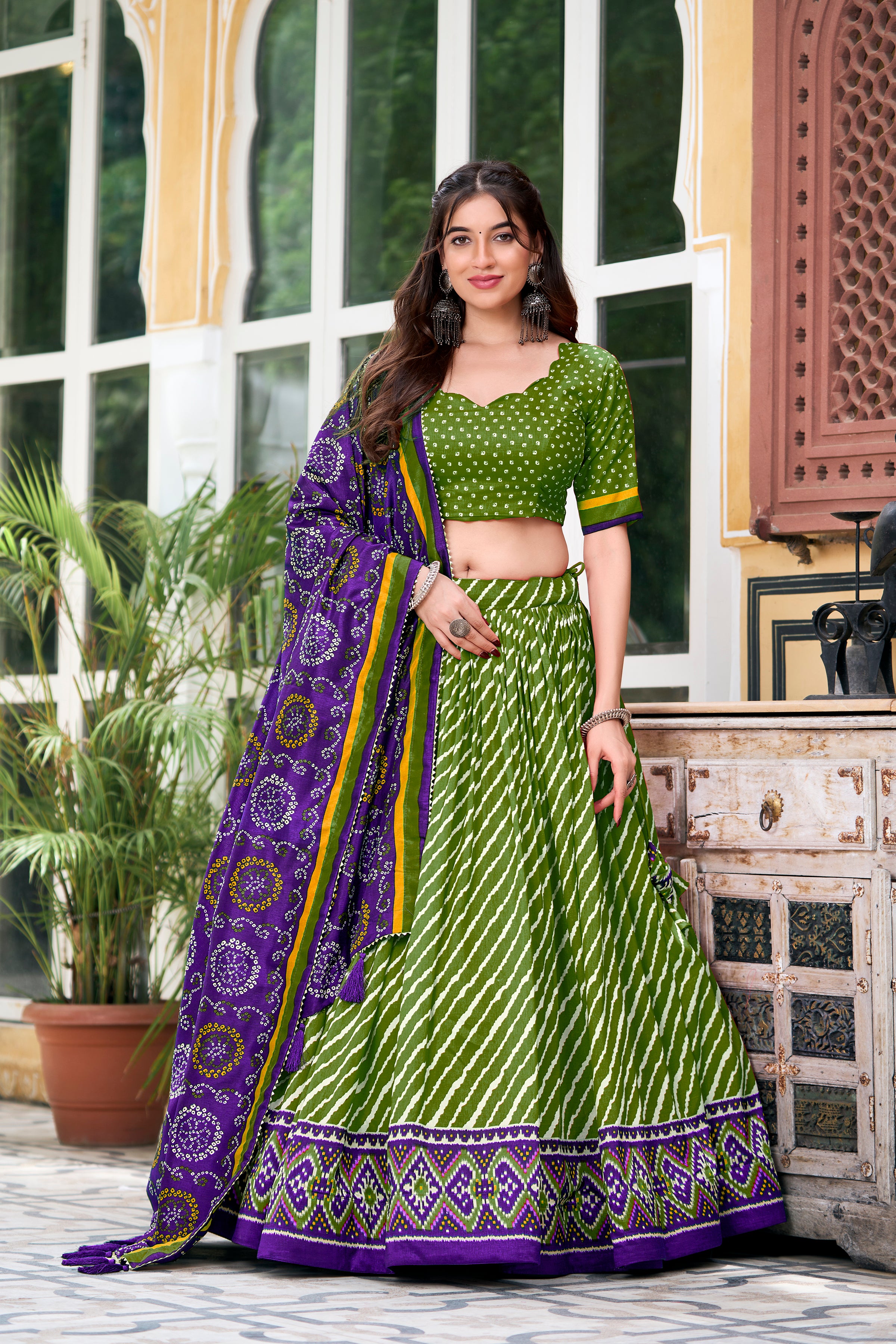 Vibrant Pink Bandhej Lehenga with Contrast Teal Dupatta