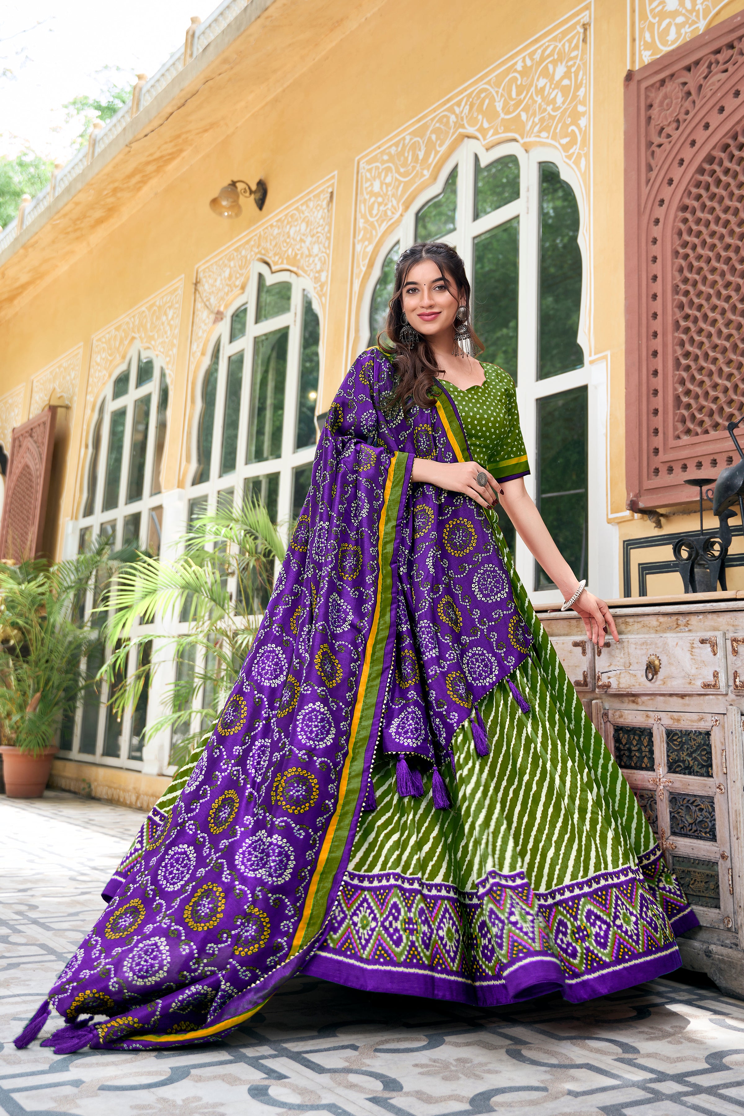 Vibrant Pink Bandhej Lehenga with Contrast Teal Dupatta