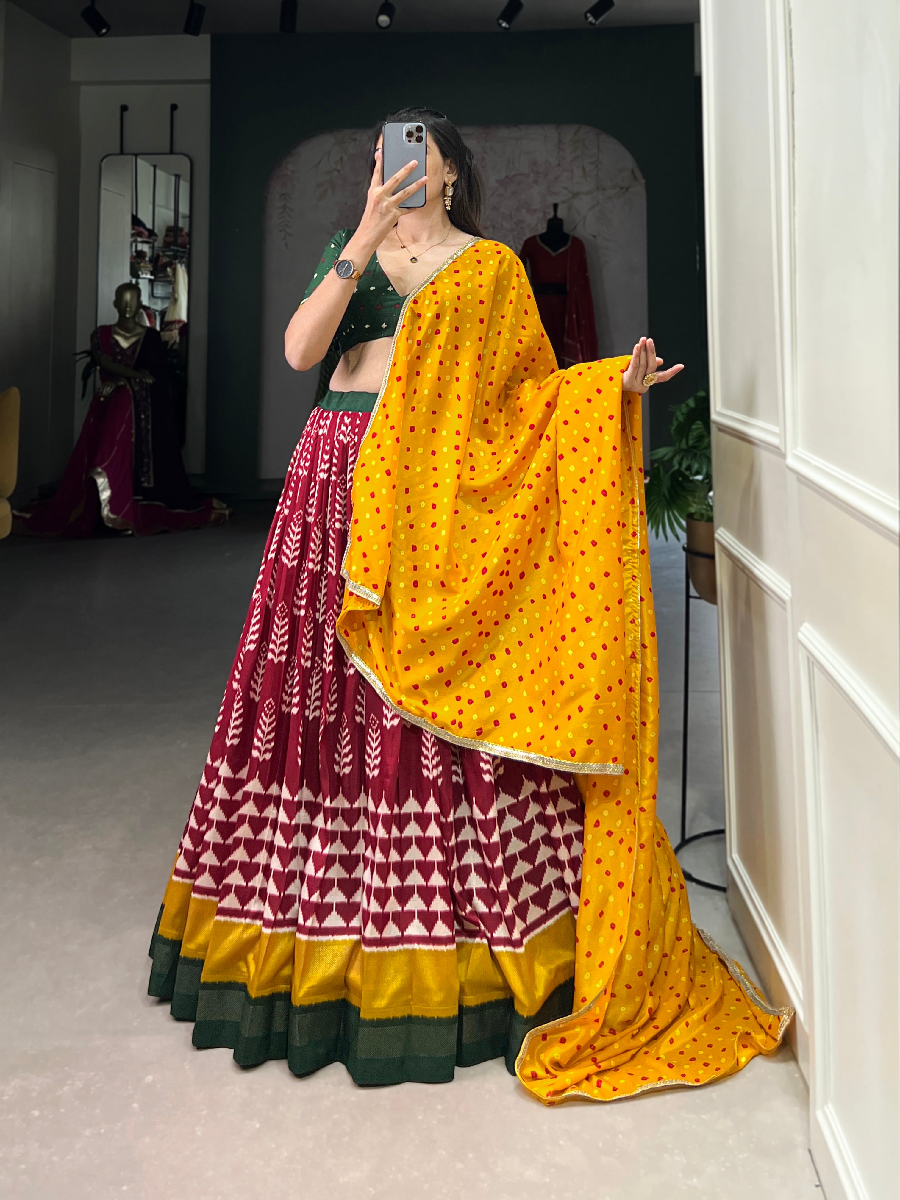 Maroon Ikat Lehenga with Green Blouse and Mustard Bandhani Dupatta