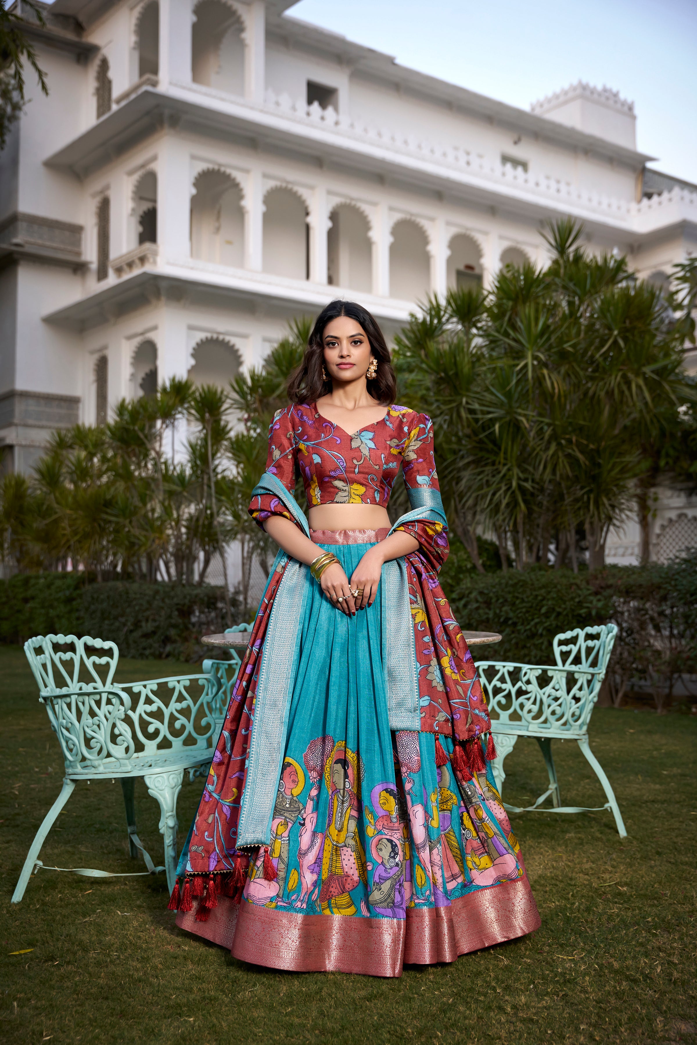 Turquoise and Artistic Print Lehenga with Copper Zari Border