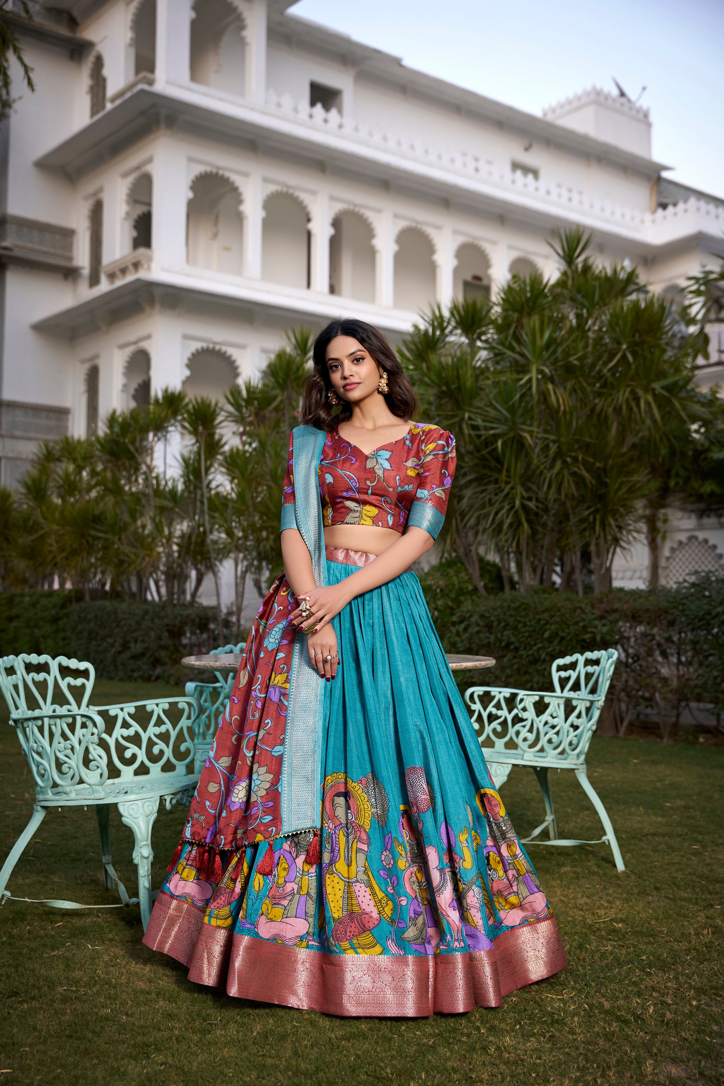 Turquoise and Artistic Print Lehenga with Copper Zari Border