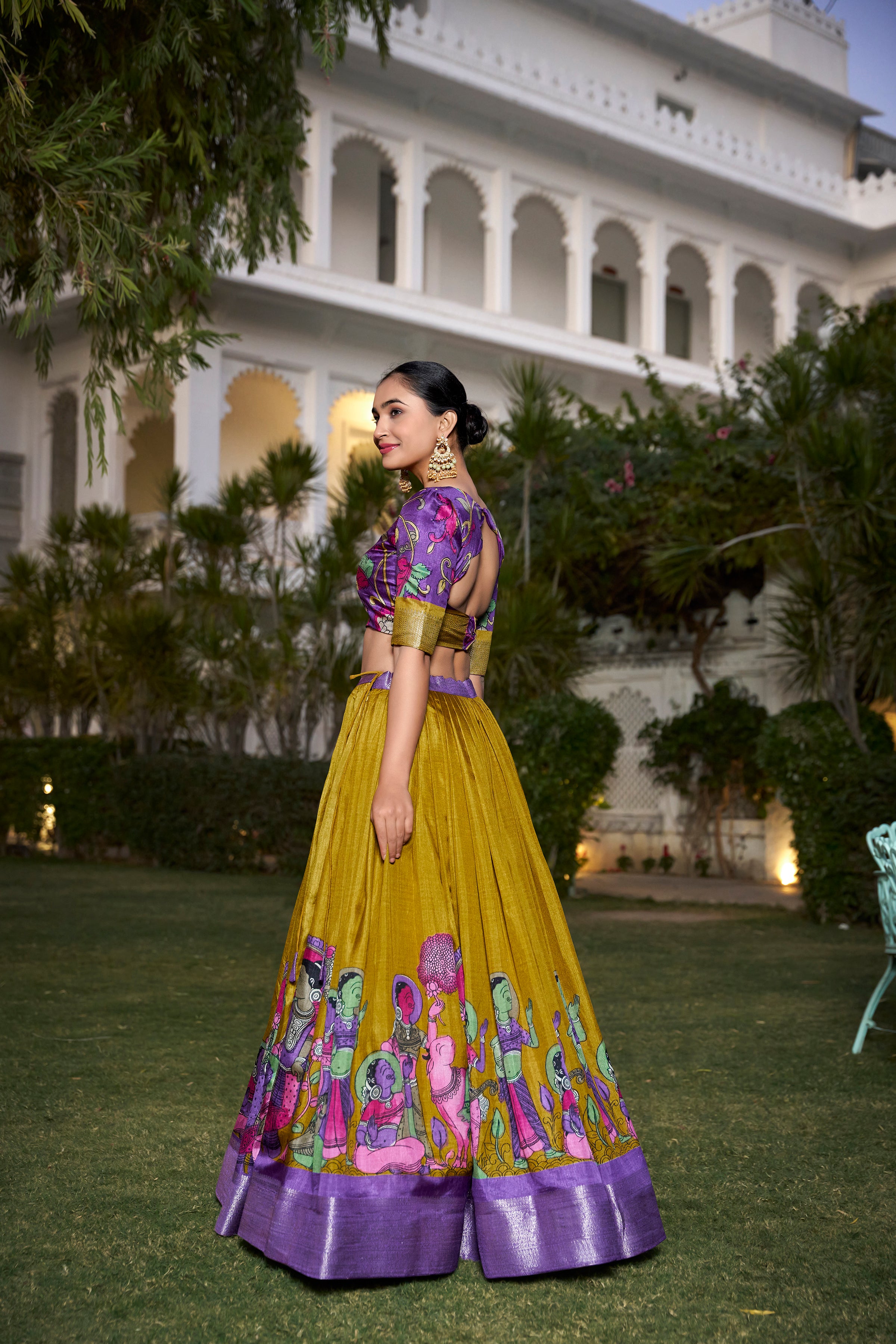 Turquoise and Artistic Print Lehenga with Copper Zari Border
