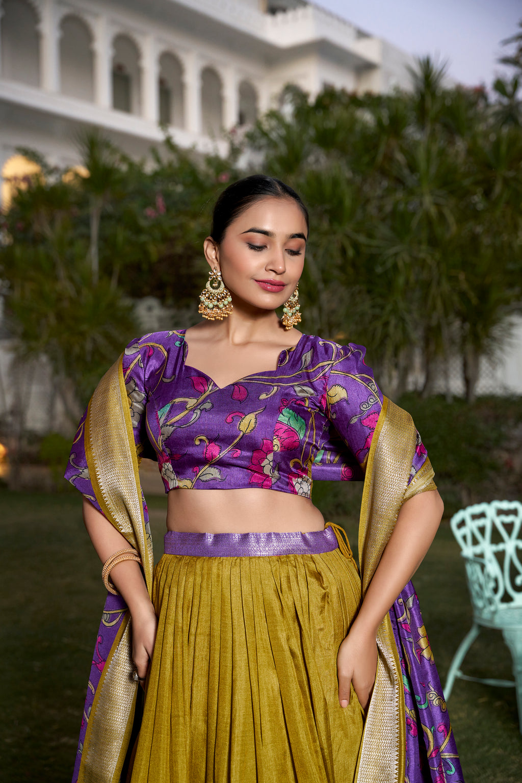 Turquoise and Artistic Print Lehenga with Copper Zari Border
