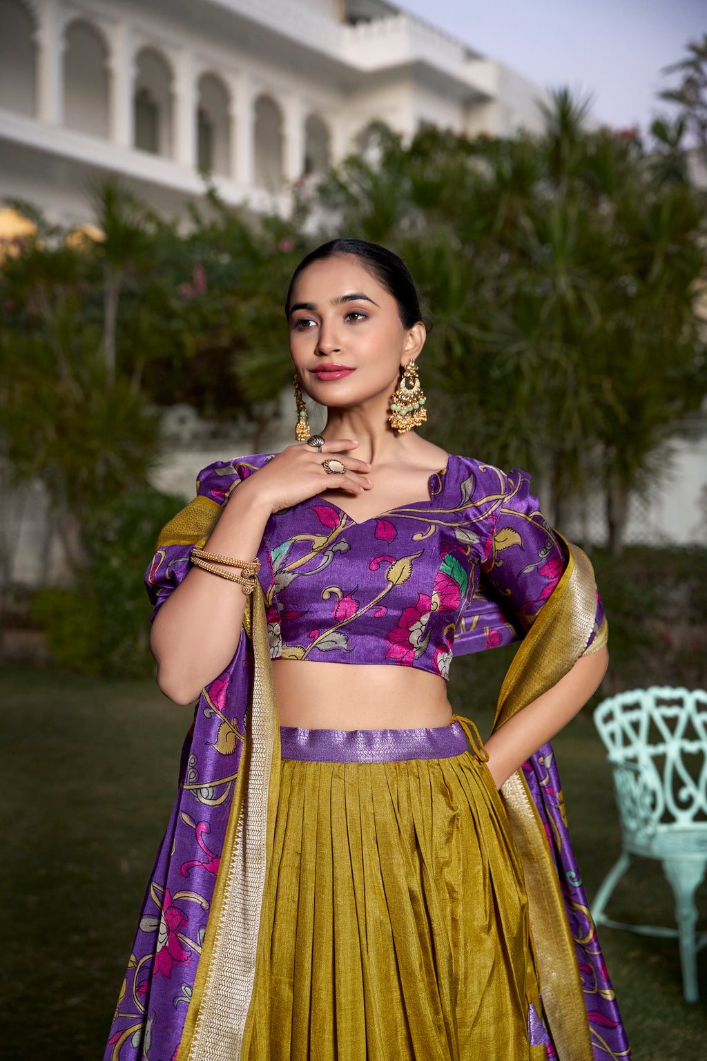 Turquoise and Artistic Print Lehenga with Copper Zari Border