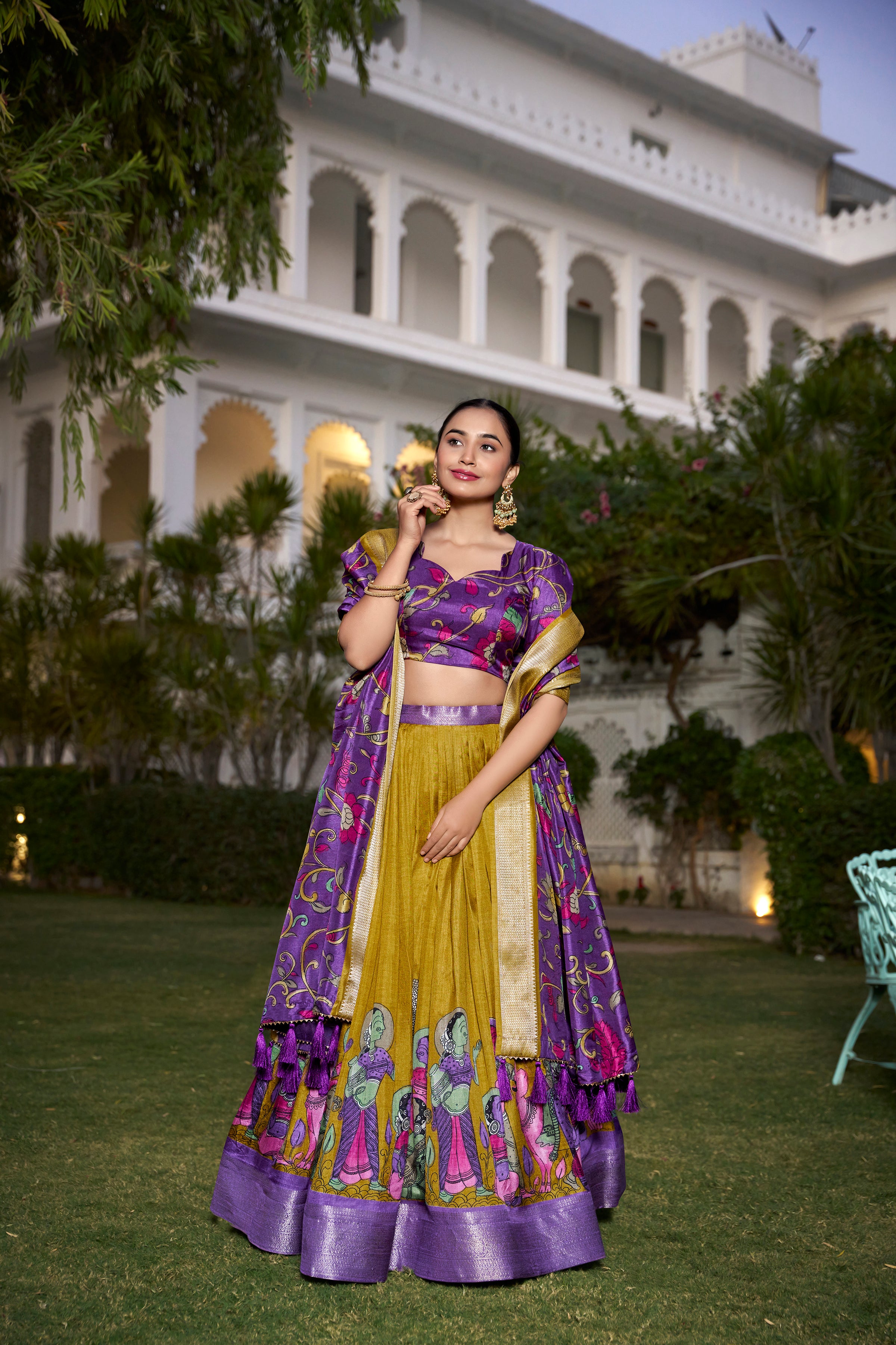 Turquoise and Artistic Print Lehenga with Copper Zari Border