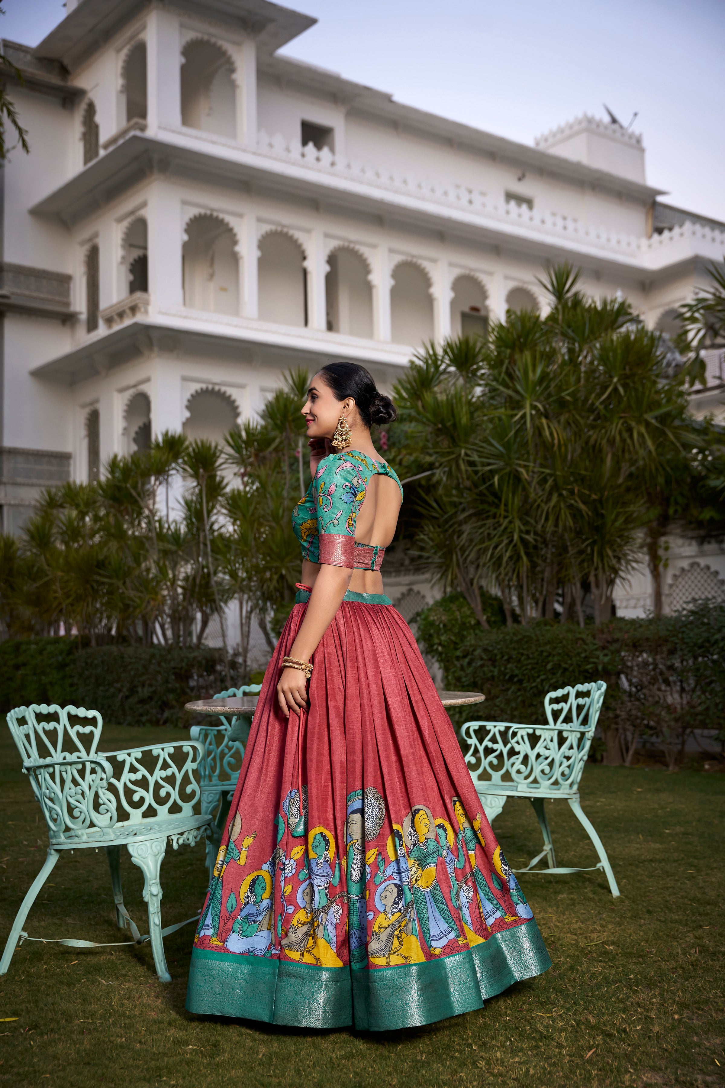 Turquoise and Artistic Print Lehenga with Copper Zari Border