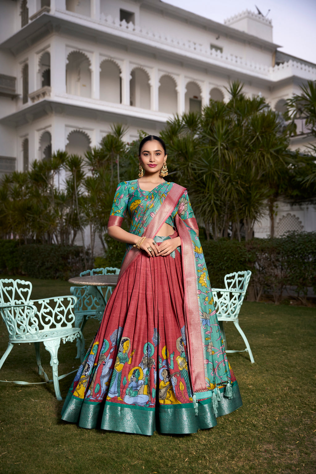 Turquoise and Artistic Print Lehenga with Copper Zari Border