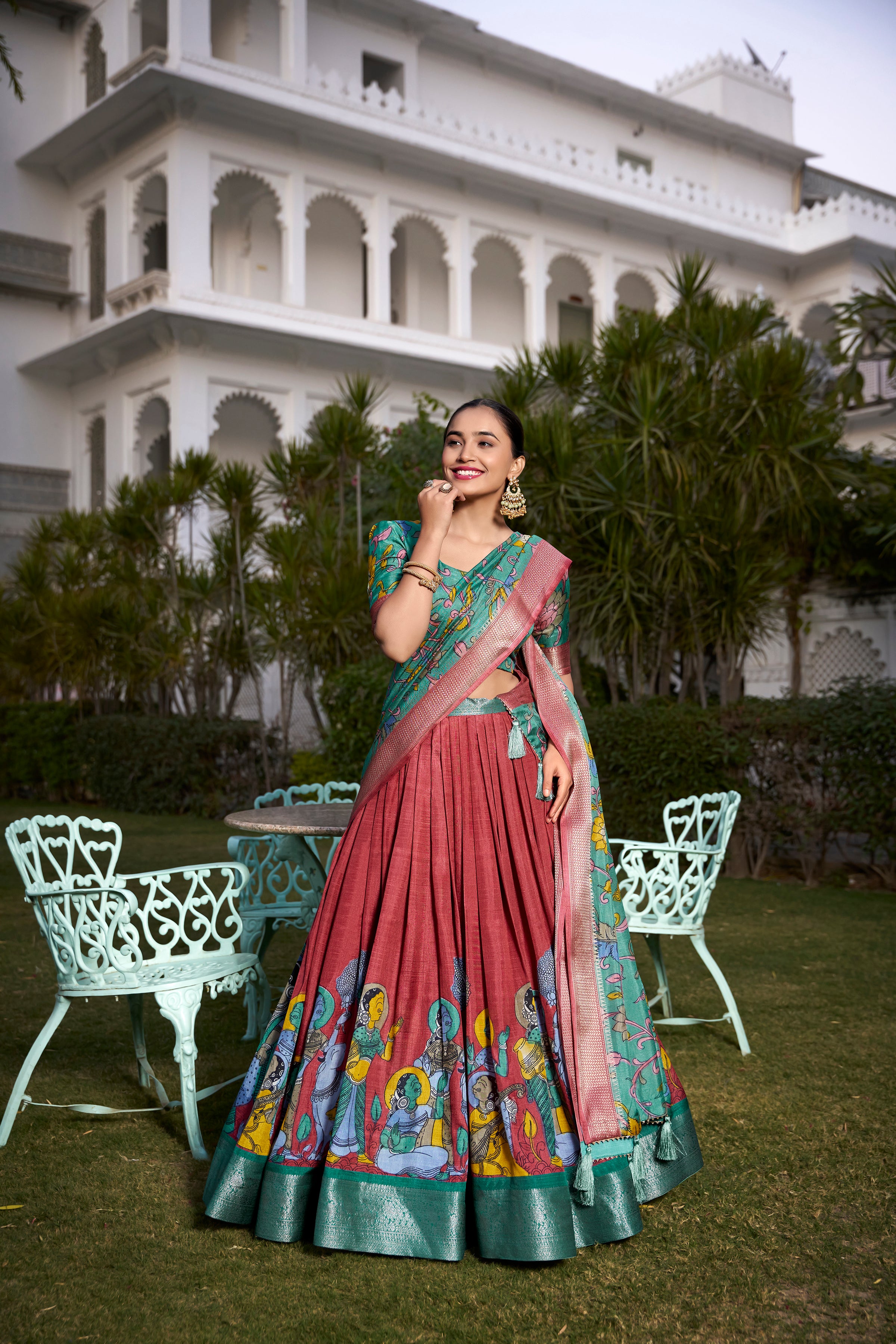 Turquoise and Artistic Print Lehenga with Copper Zari Border