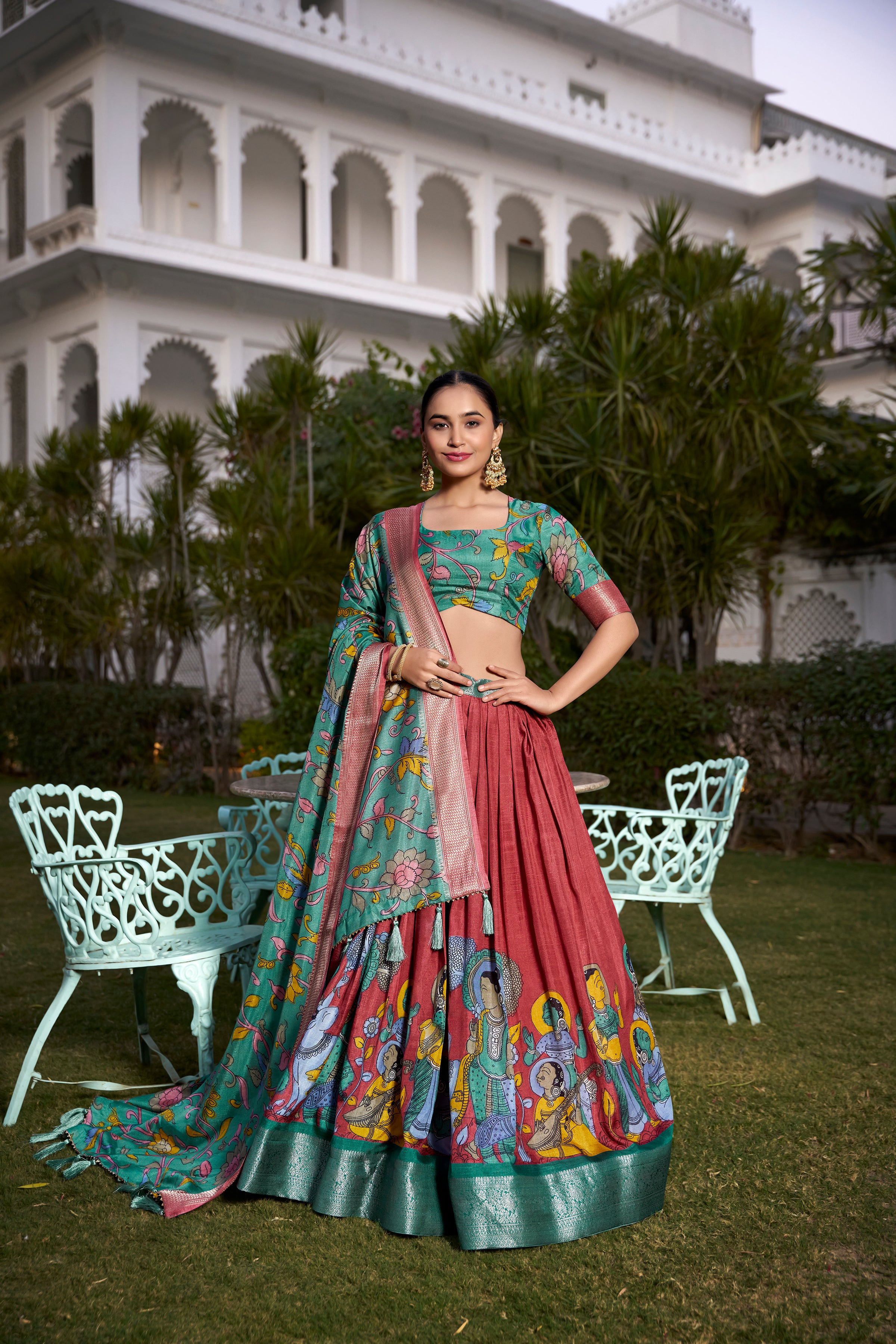 Turquoise and Artistic Print Lehenga with Copper Zari Border