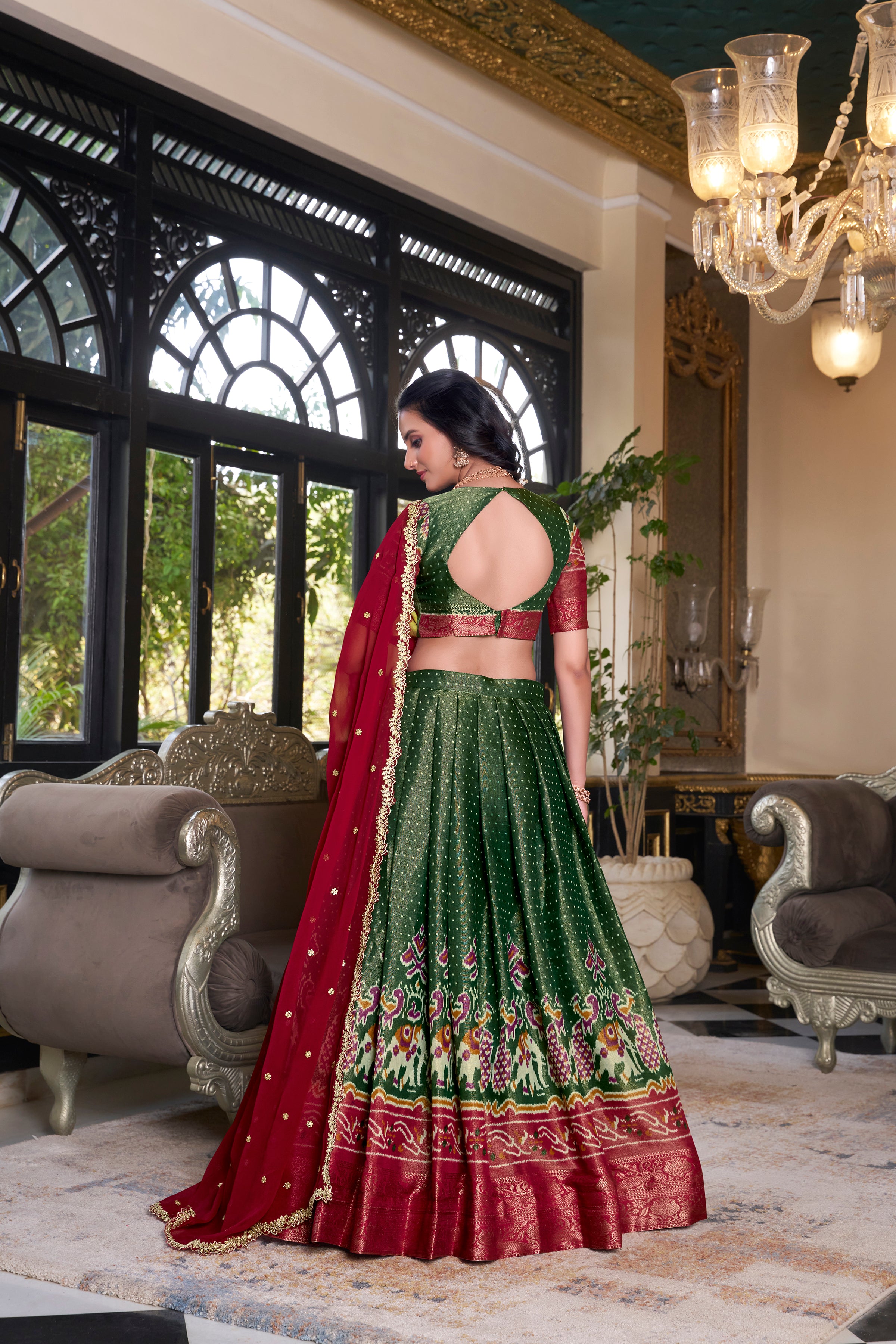 Elegant Woman in a Traditional Gujarati Patola Lehenga Choli.