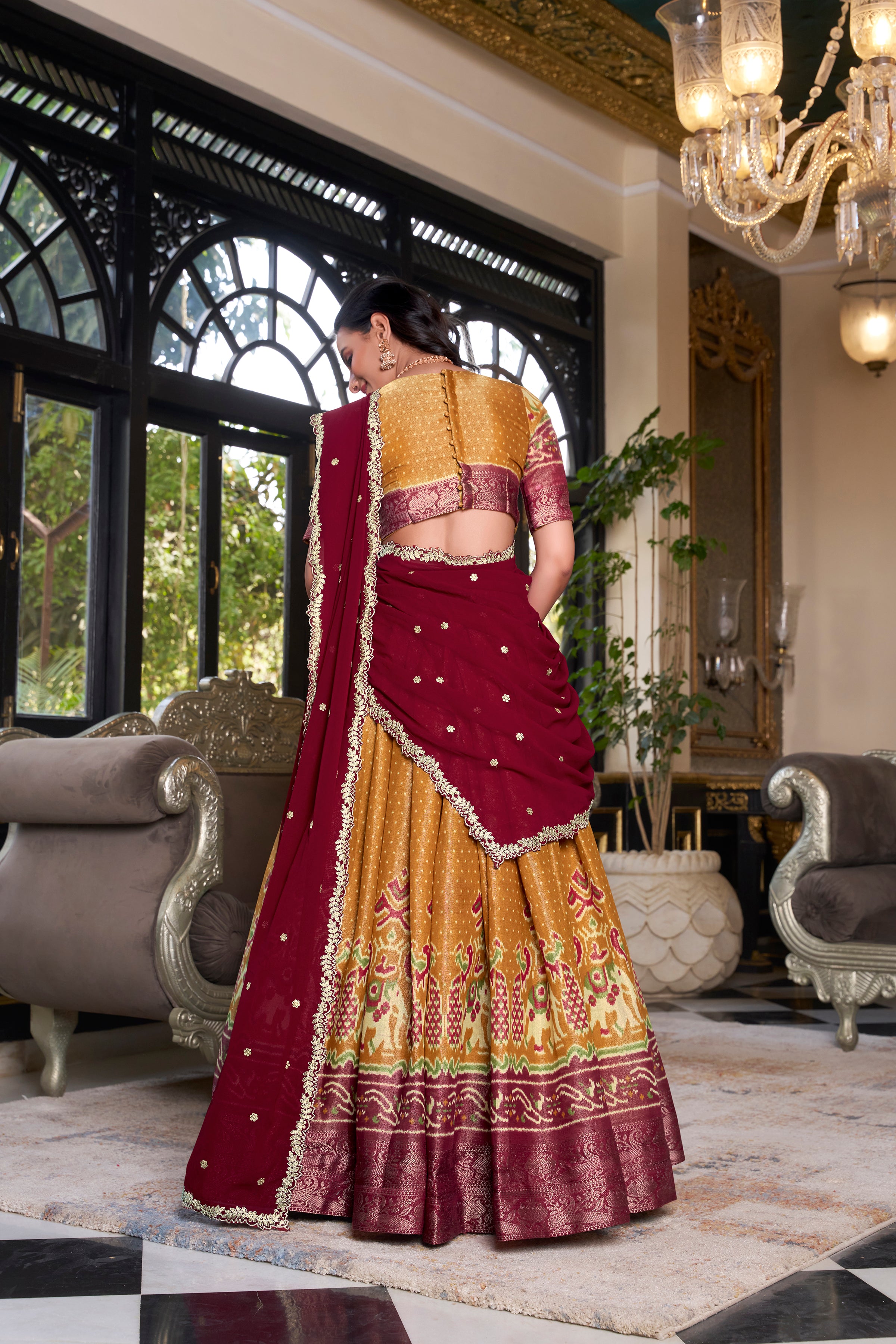 Elegant Woman in a Traditional Gujarati Patola Lehenga Choli.