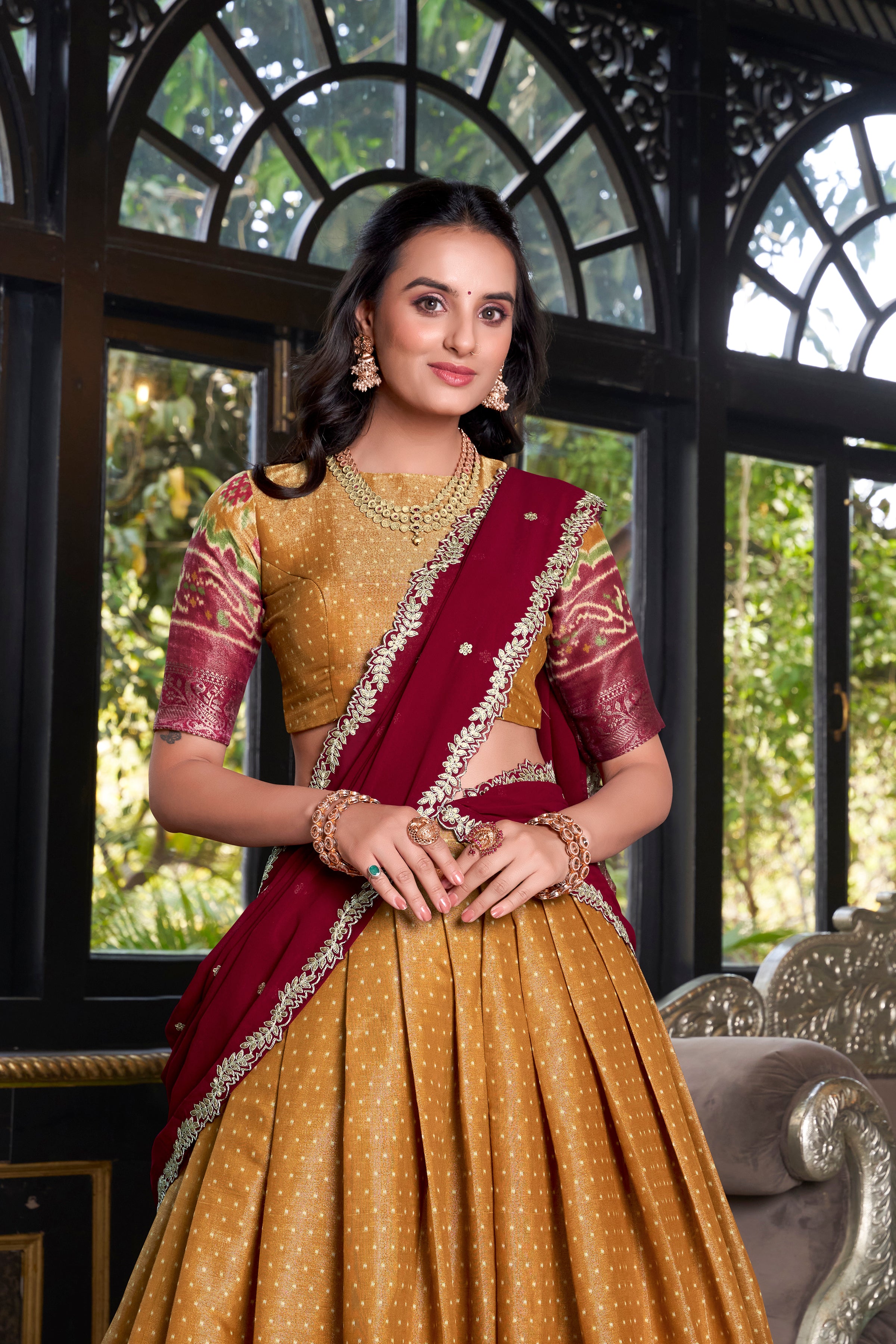 Elegant Woman in a Traditional Gujarati Patola Lehenga Choli.