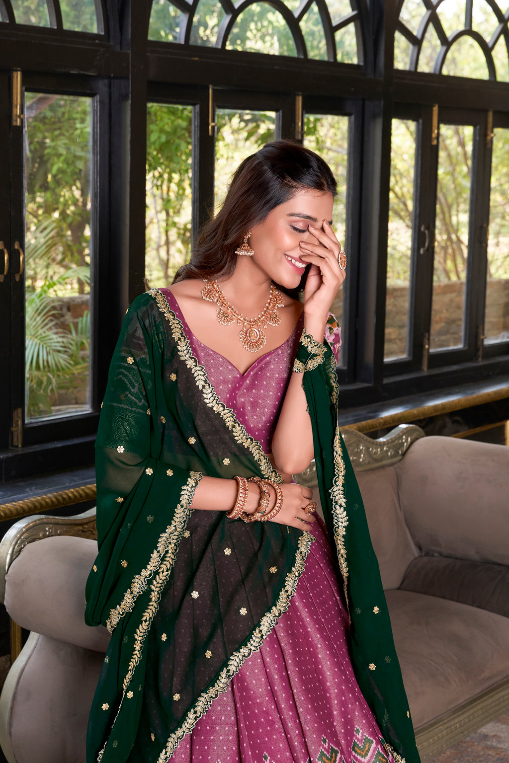 Elegant Woman in a Traditional Gujarati Patola Lehenga Choli.
