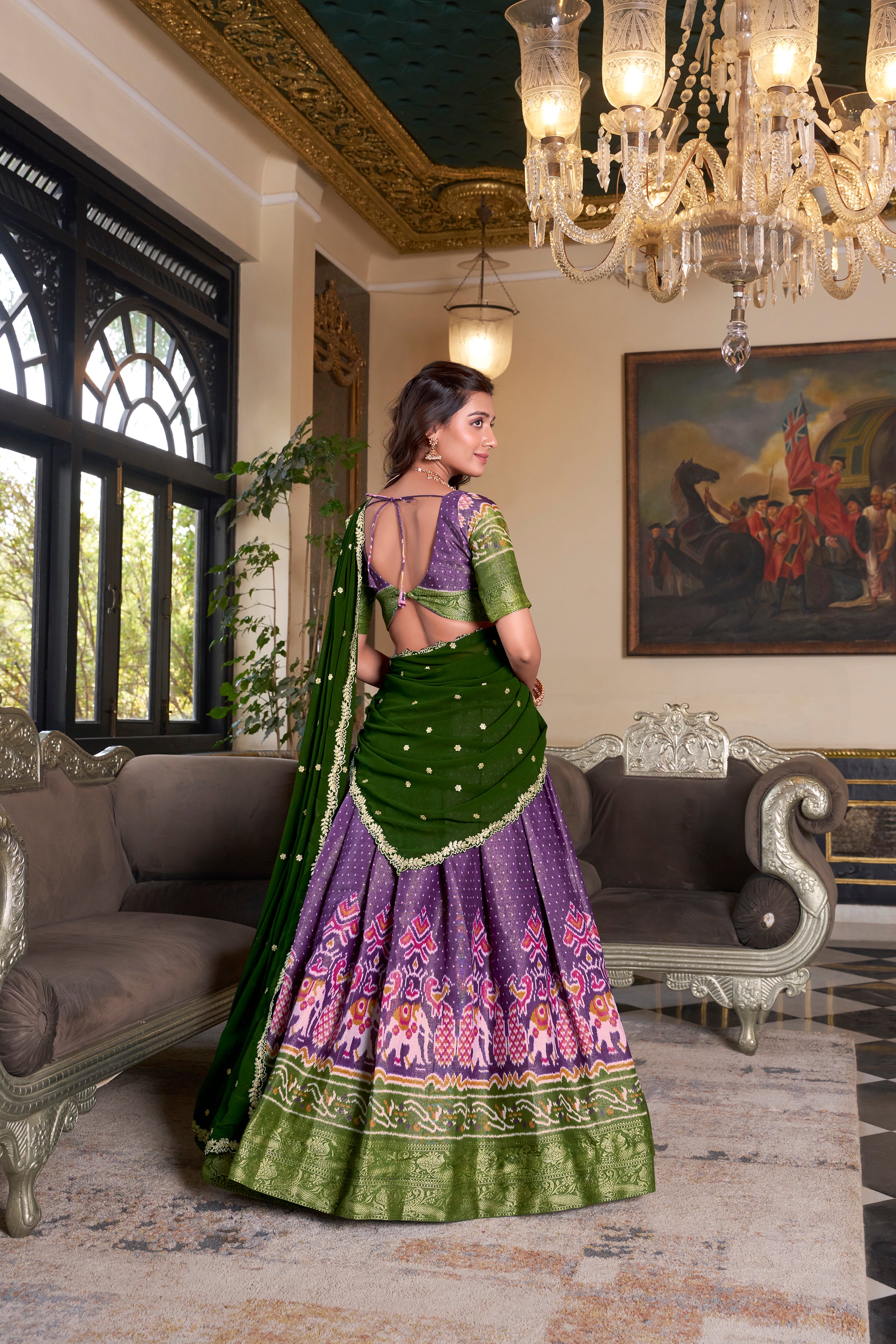 Elegant Woman in a Traditional Gujarati Patola Lehenga Choli.