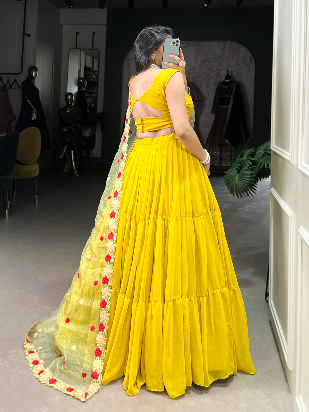 Vibrant Yellow Tiered Lehenga Choli with Floral Embroidered Dupatta