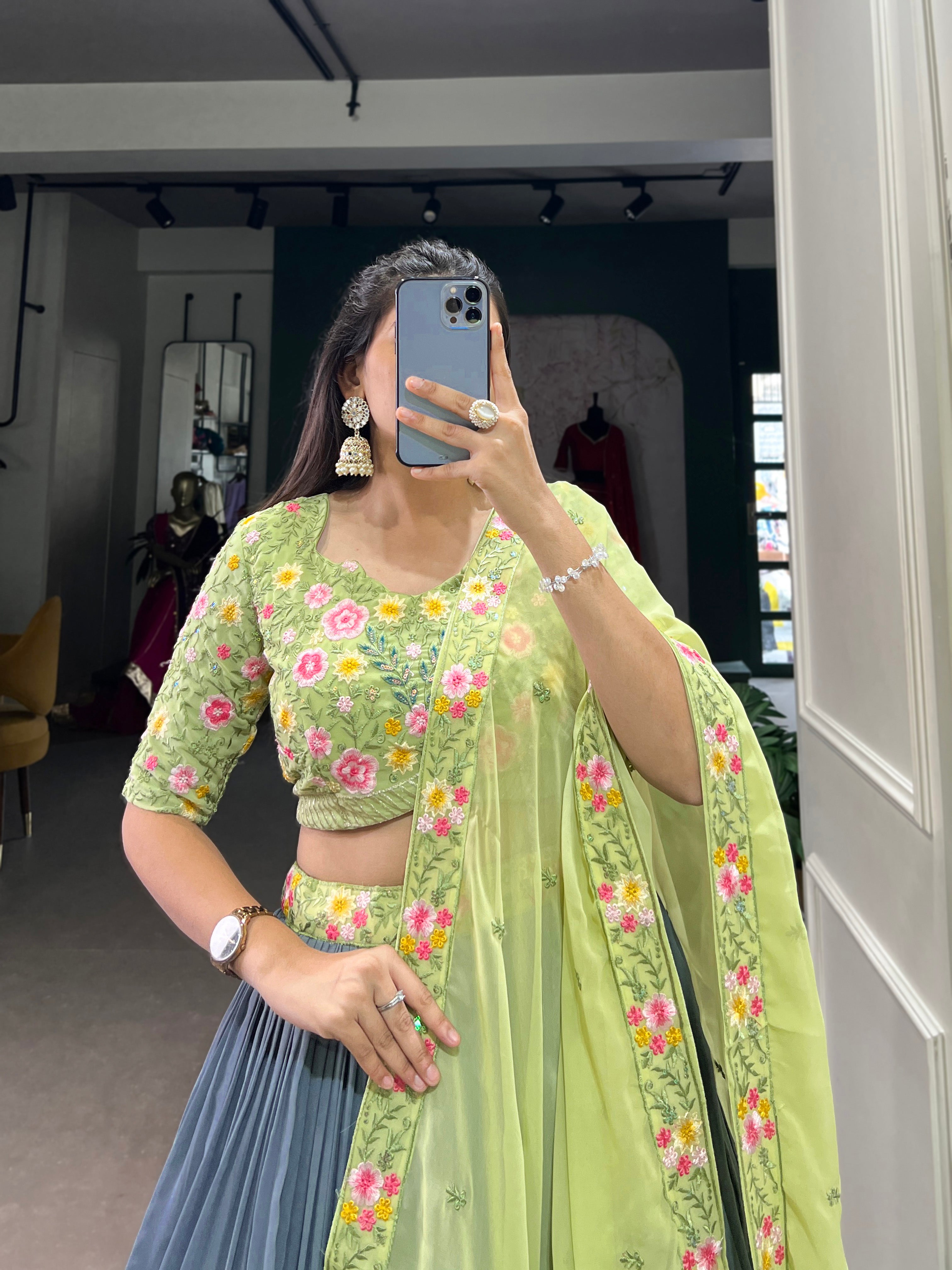 Elegant  paired with a Heavily Embroidered Lime Green Choli and Bordered Dupatta