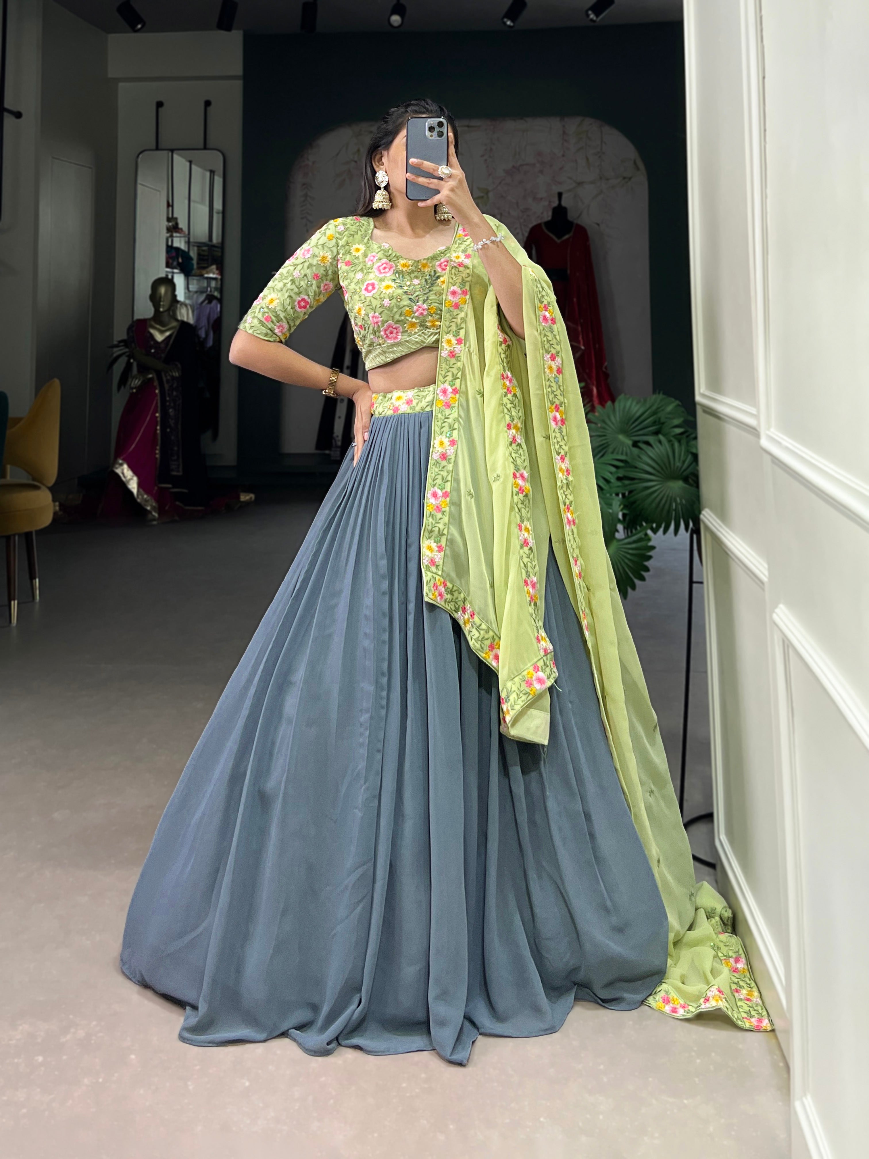 Elegant  paired with a Heavily Embroidered Lime Green Choli and Bordered Dupatta