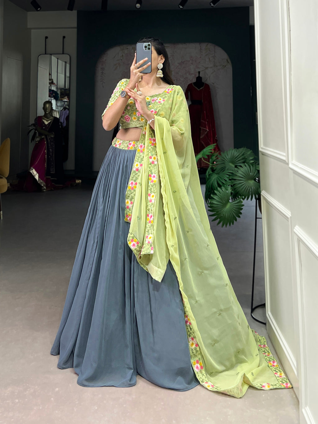 Elegant  paired with a Heavily Embroidered Lime Green Choli and Bordered Dupatta