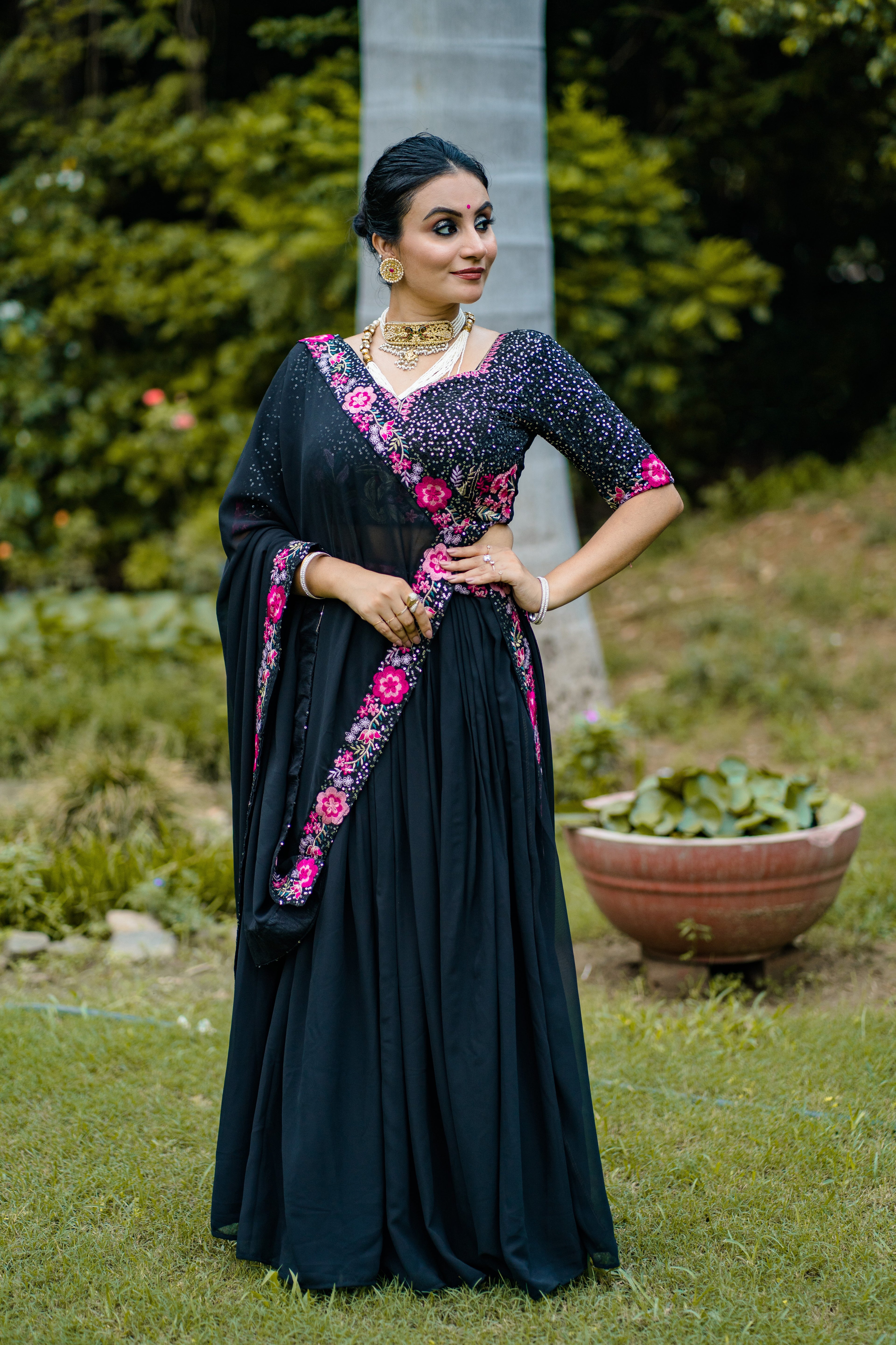 Elegant Black Lehenga Choli with Rani Pink Floral Embroidery