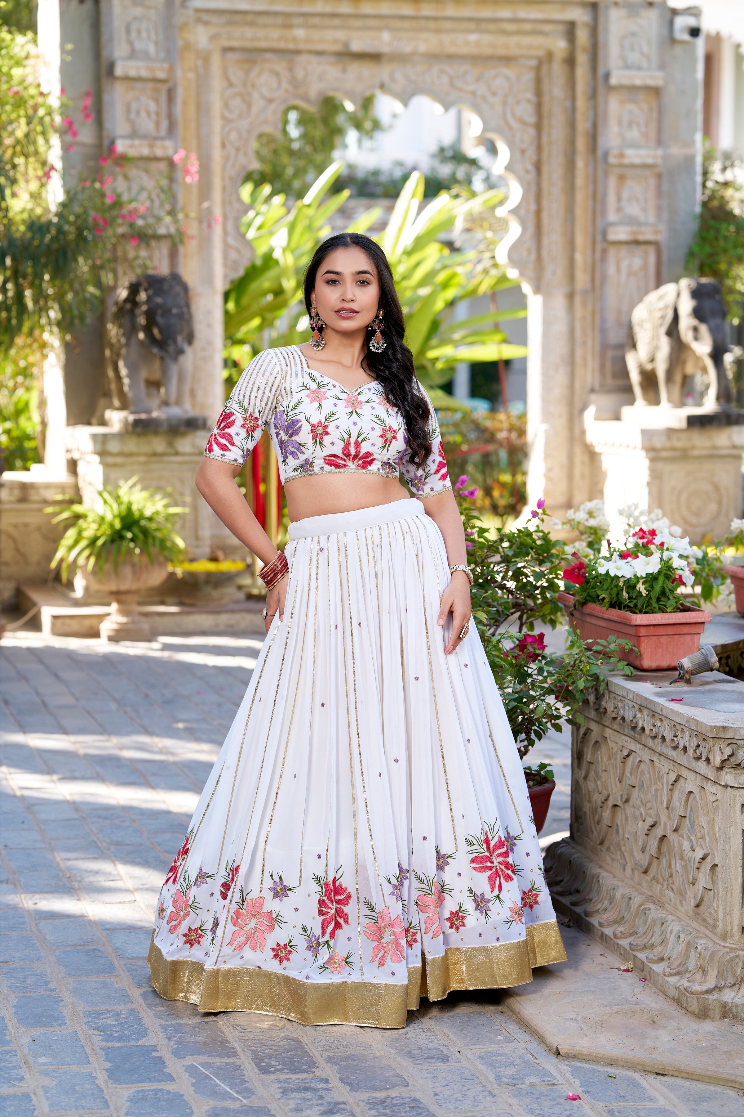Serene White Lehenga with a Vibrant Floral Garden Print and Gold Border