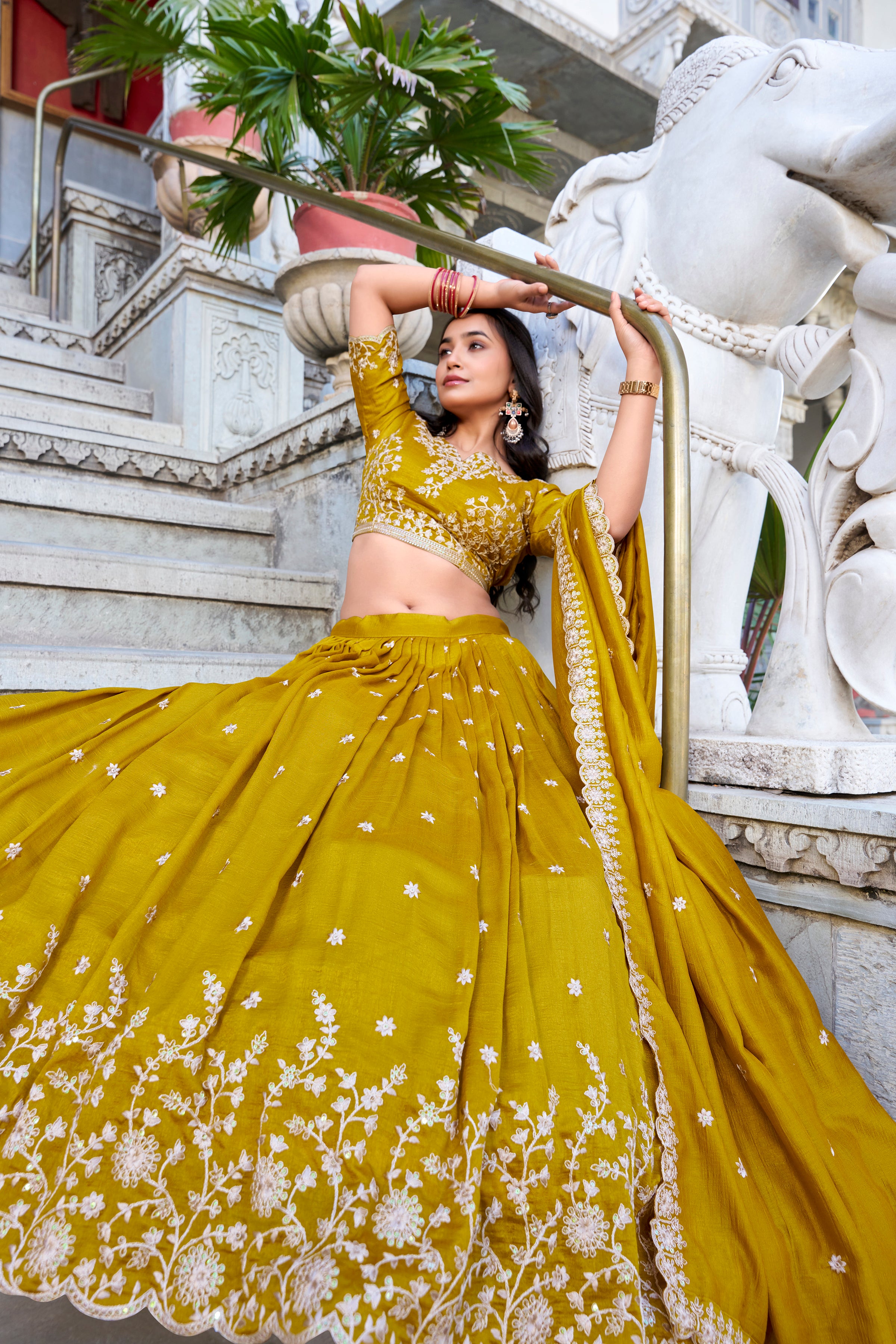 Sun-kissed sophistication in an exquisite mustard yellow lehenga.