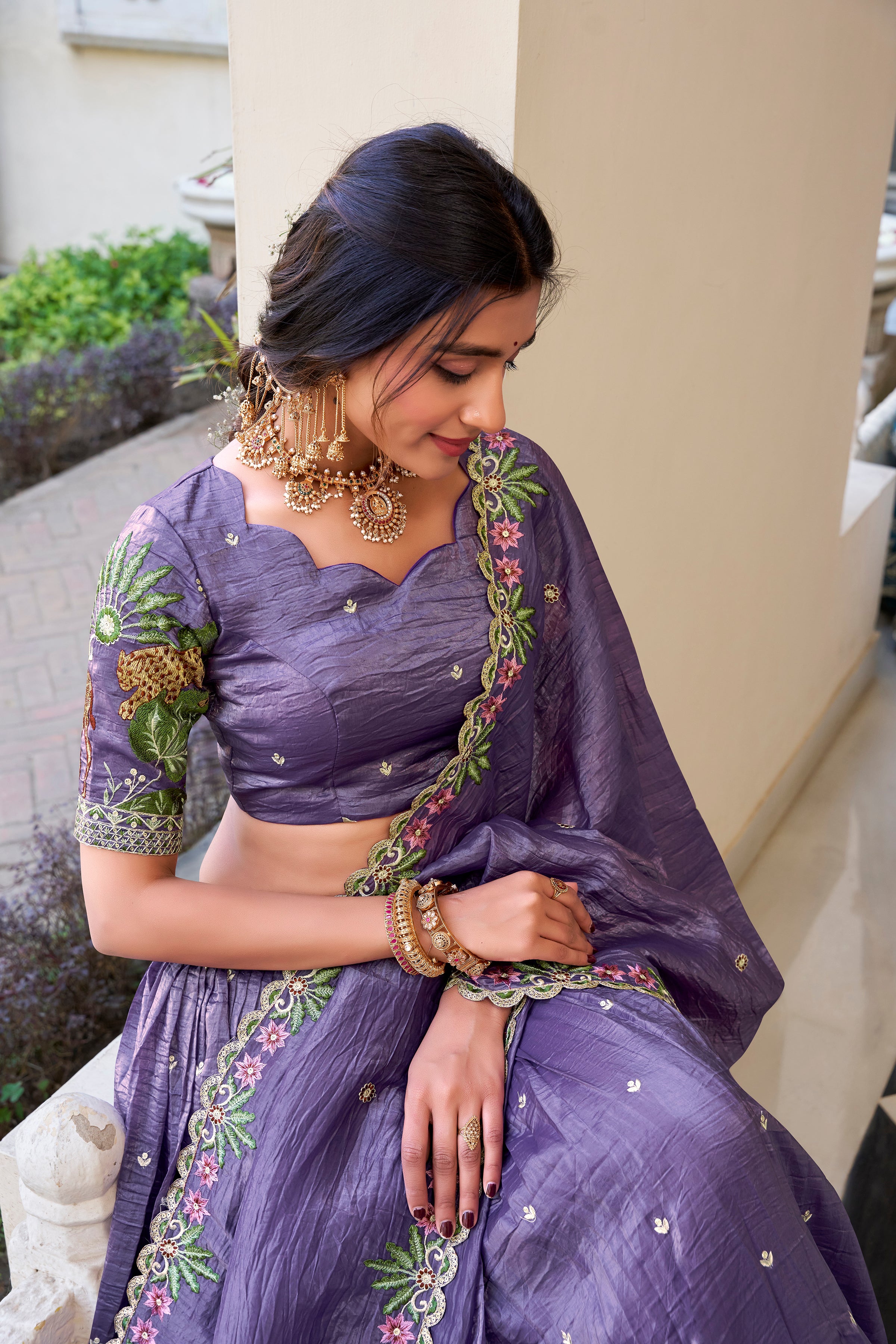 Graceful allure in a stunning dusty rose lehenga.