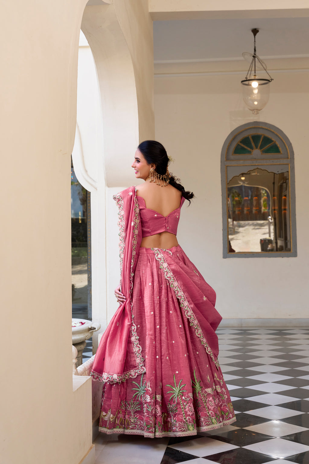 Graceful allure in a stunning dusty rose lehenga.