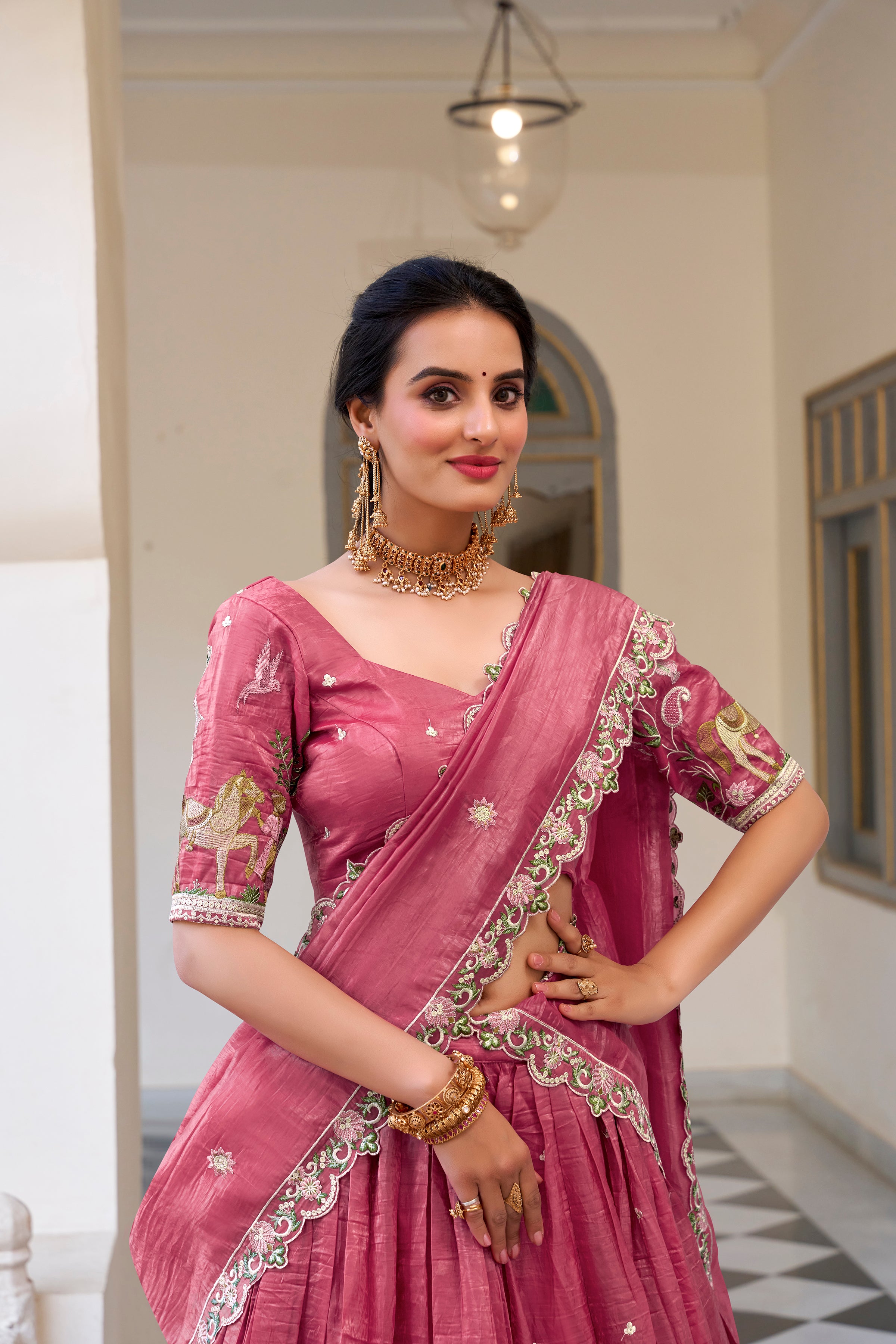 Graceful allure in a stunning dusty rose lehenga.