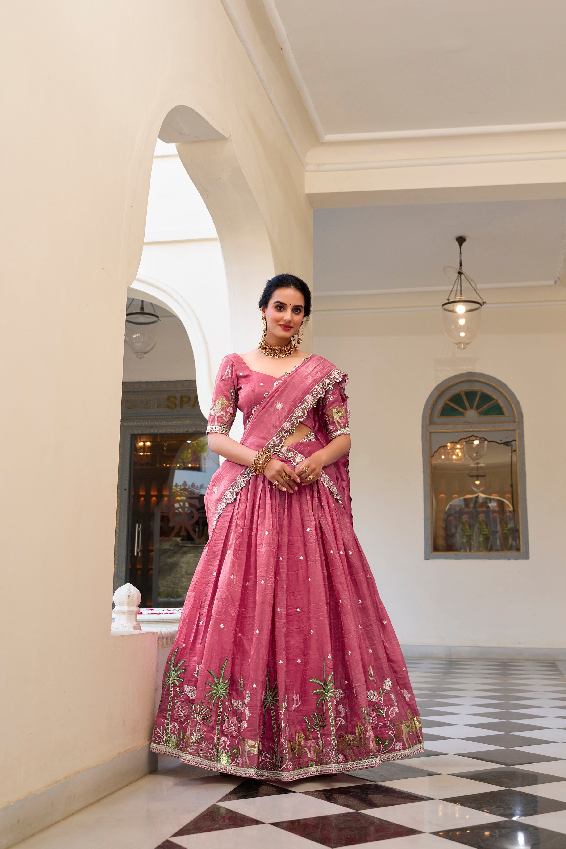 Graceful allure in a stunning dusty rose lehenga.