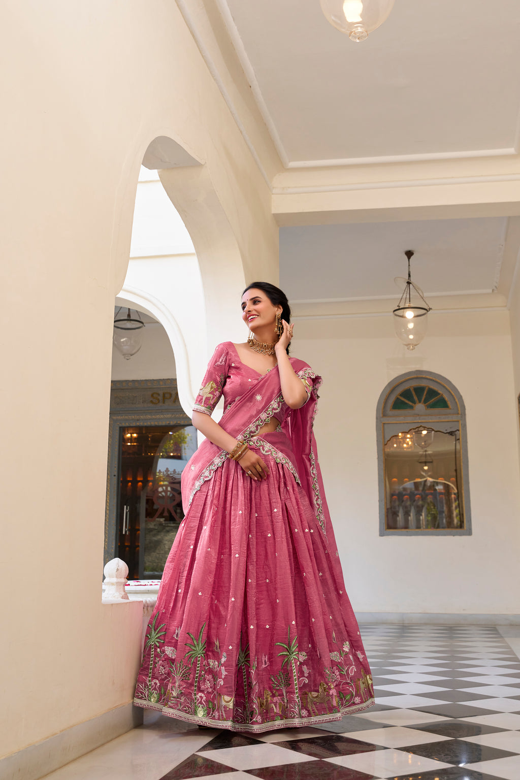 Graceful allure in a stunning dusty rose lehenga.