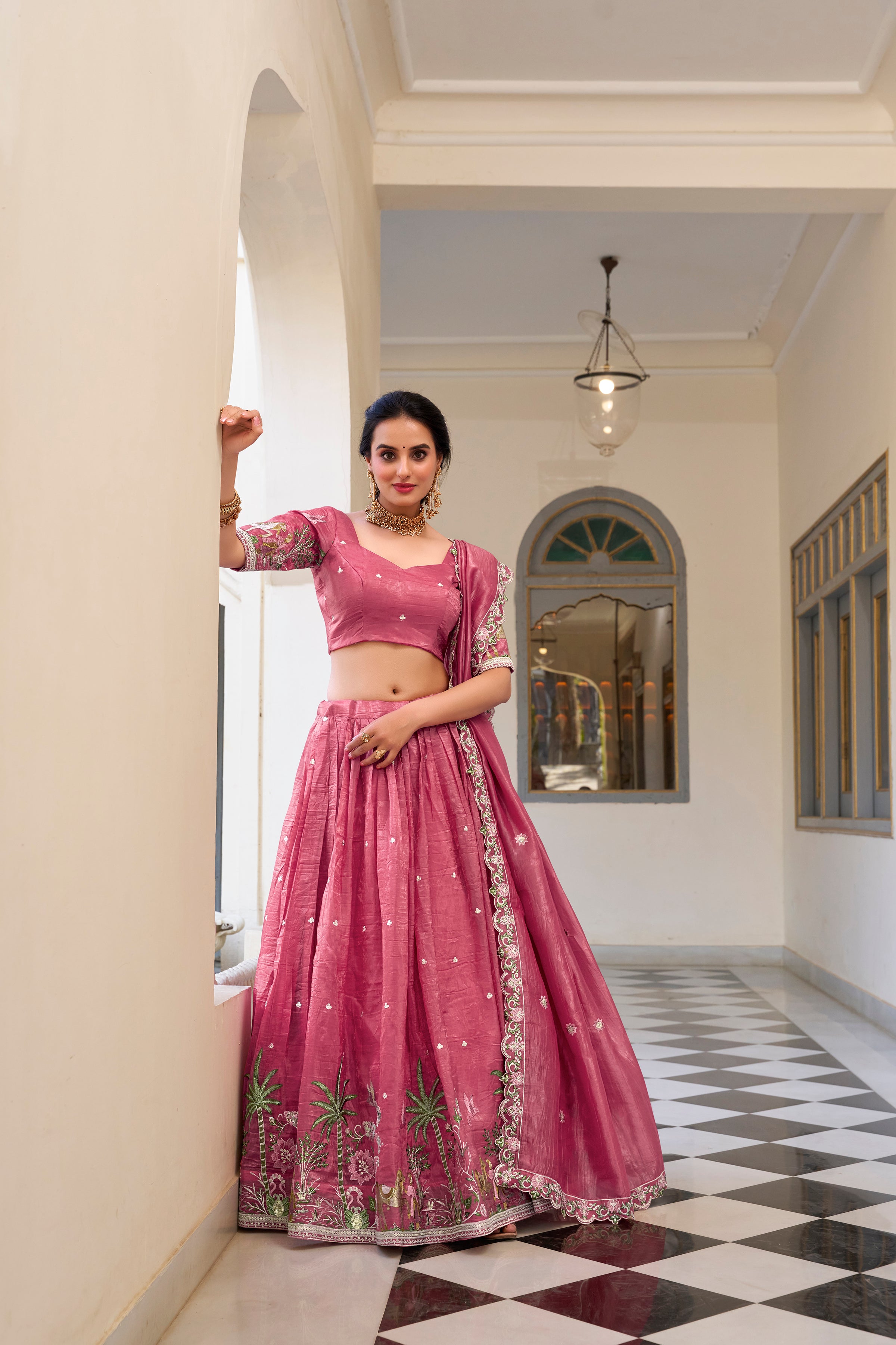 Graceful allure in a stunning dusty rose lehenga.