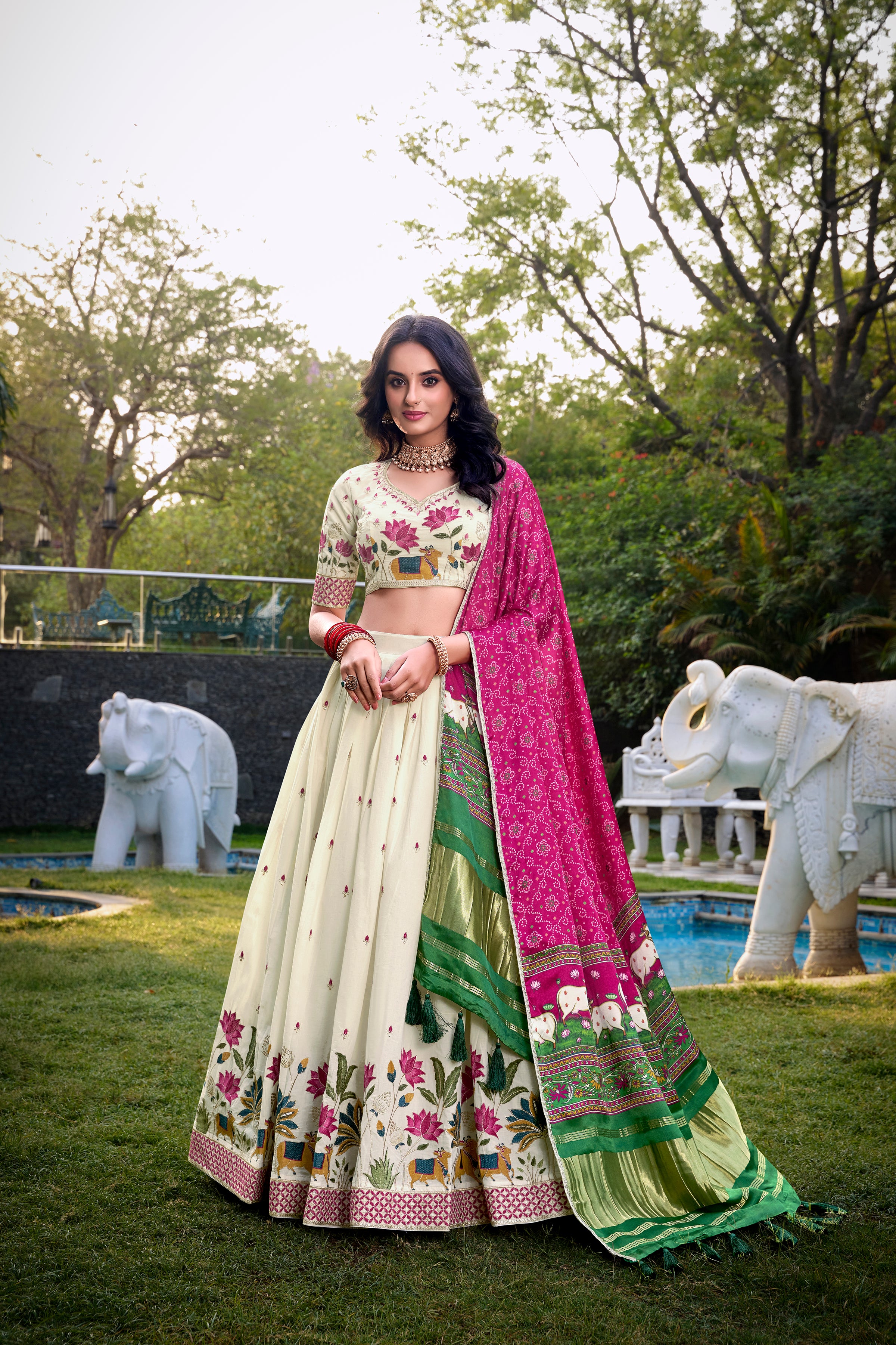 A vision of grace in an ivory lehenga adorned with peacock motifs.