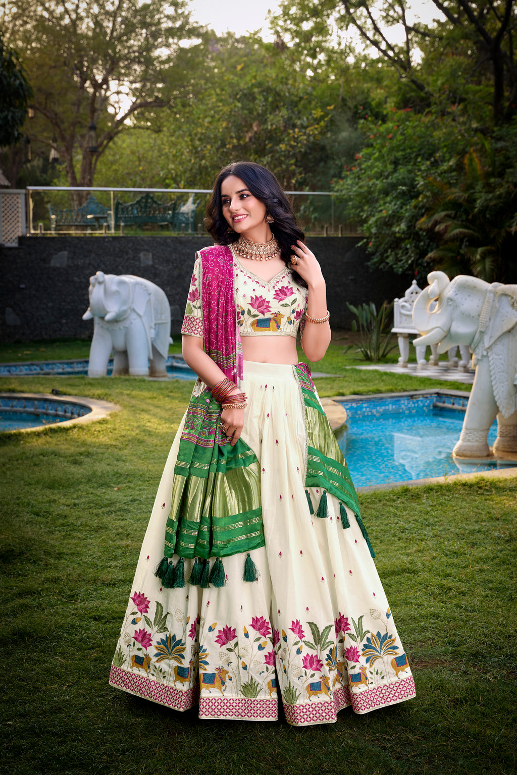 A vision of grace in an ivory lehenga adorned with peacock motifs.