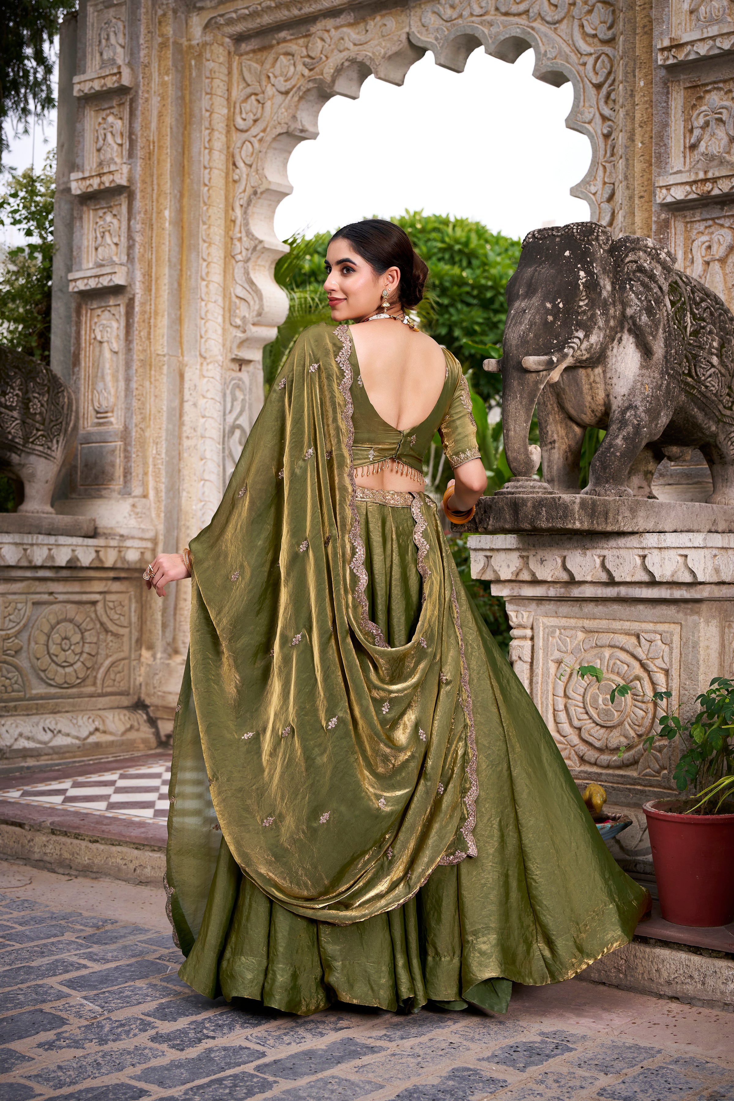 Designer Rose Gold Lehenga in Crushed Shimmer Fabric with an Embroidered
