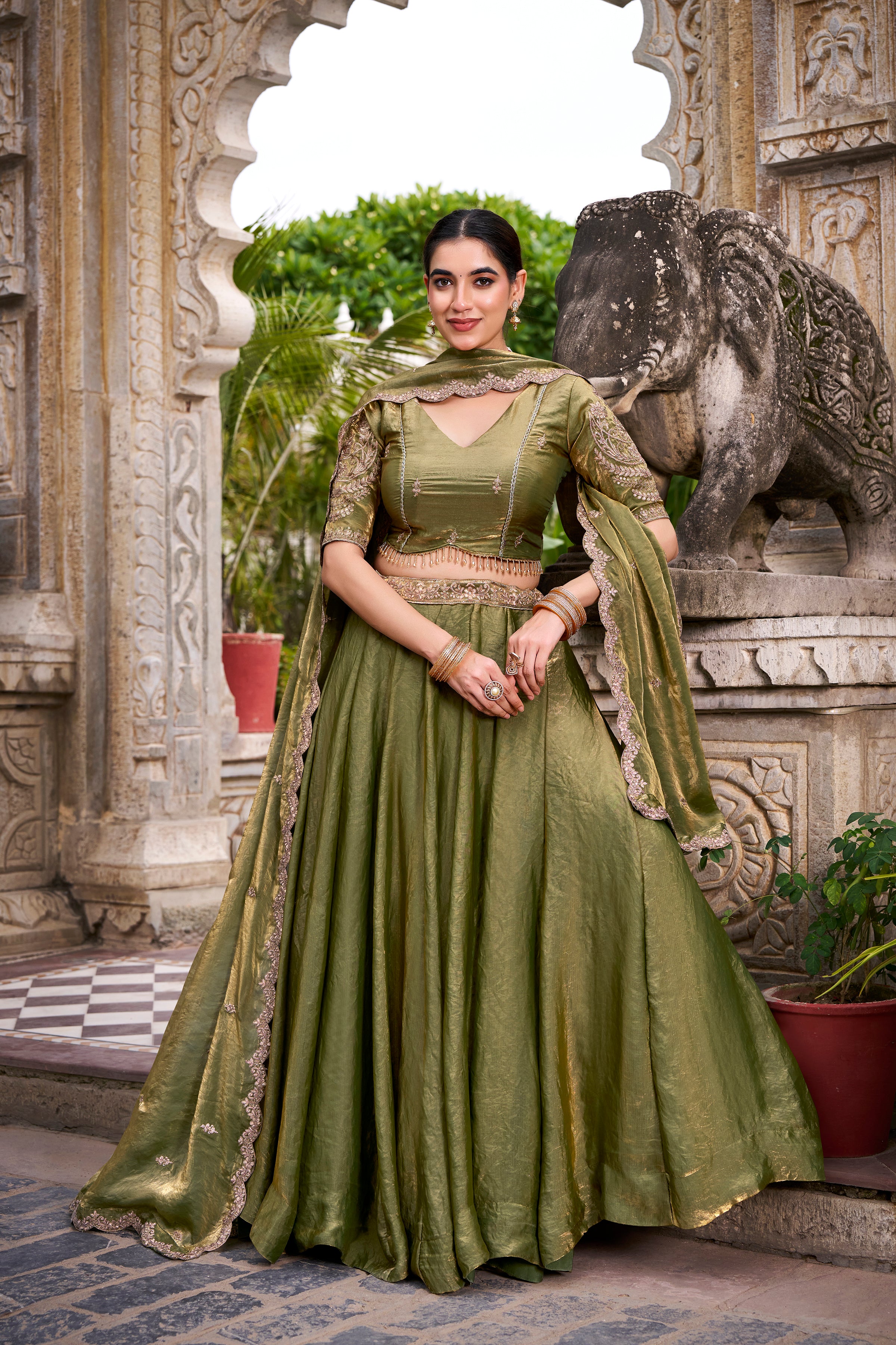 Designer Rose Gold Lehenga in Crushed Shimmer Fabric with an Embroidered
