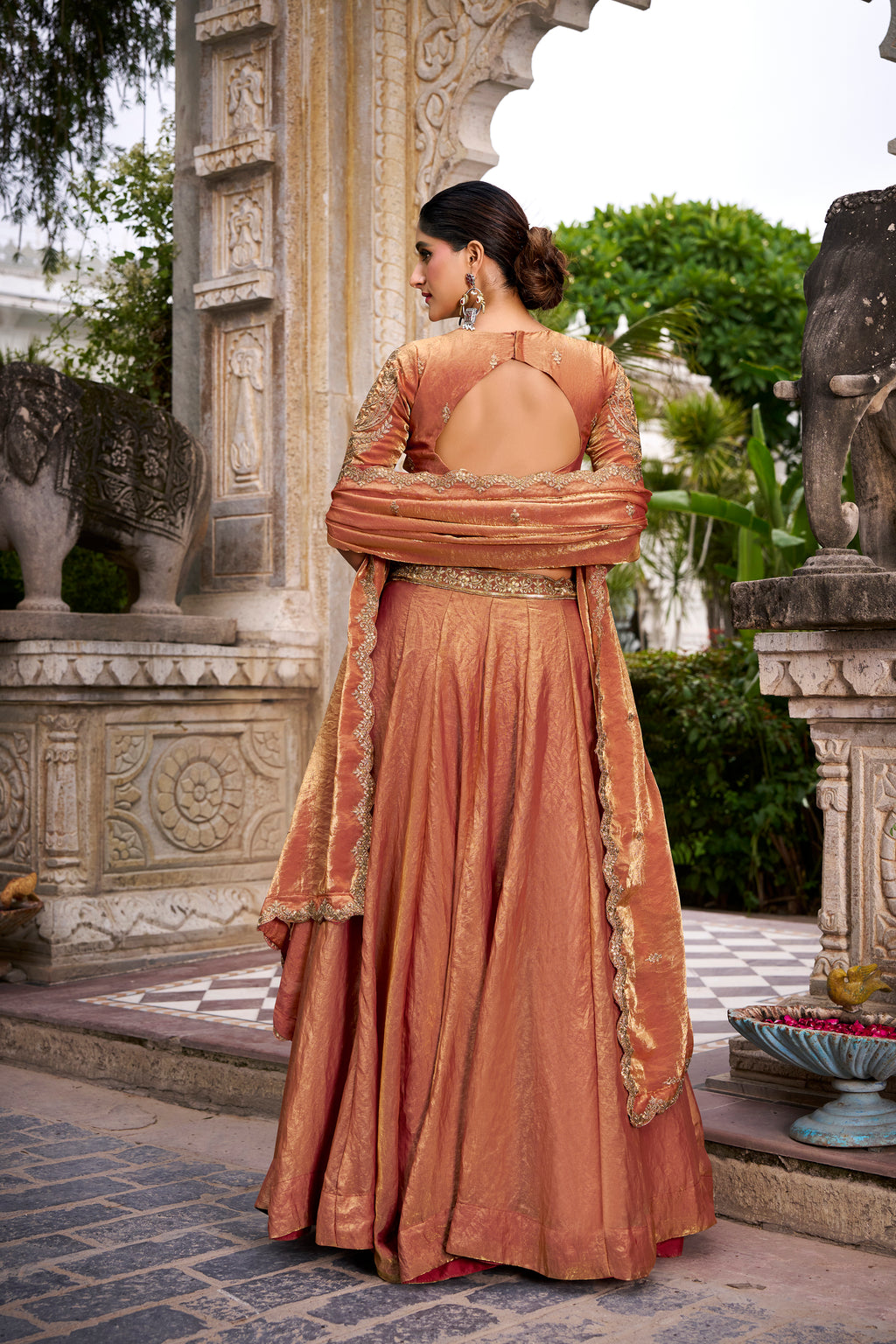 Designer Rose Gold Lehenga in Crushed Shimmer Fabric with an Embroidered