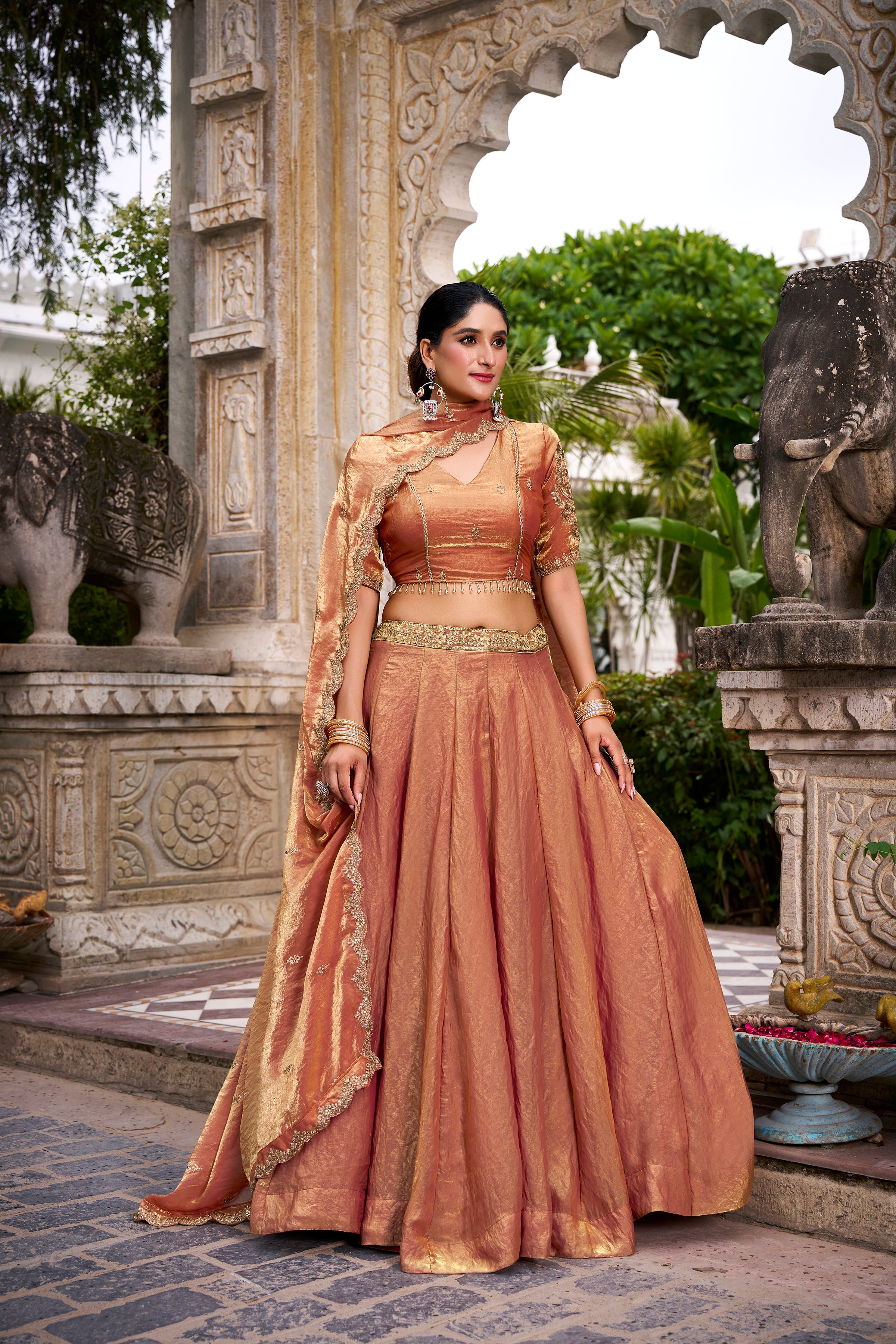 Designer Rose Gold Lehenga in Crushed Shimmer Fabric with an Embroidered