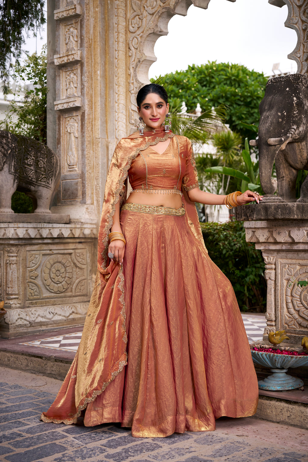 Designer Rose Gold Lehenga in Crushed Shimmer Fabric with an Embroidered