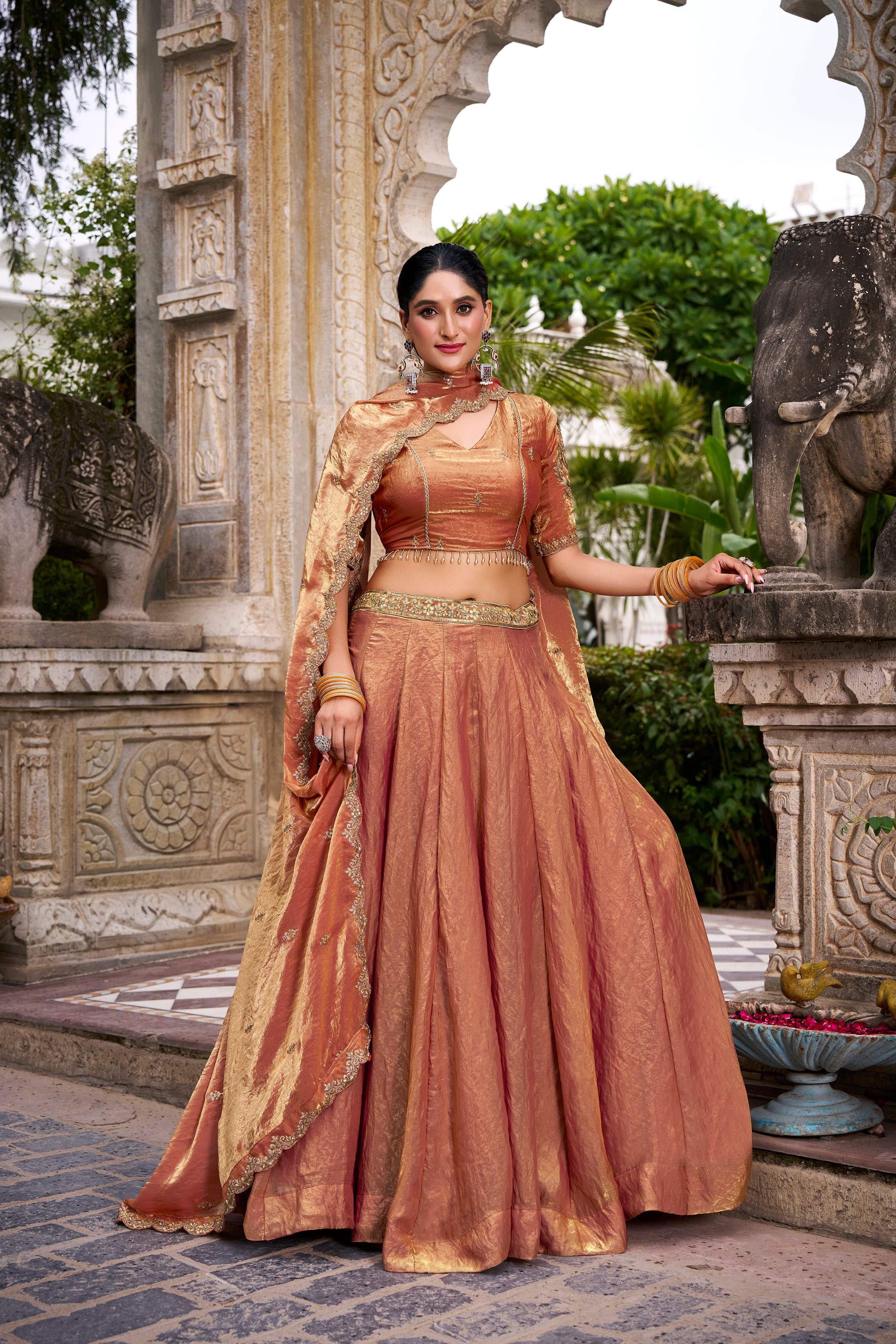 Designer Rose Gold Lehenga in Crushed Shimmer Fabric with an Embroidered