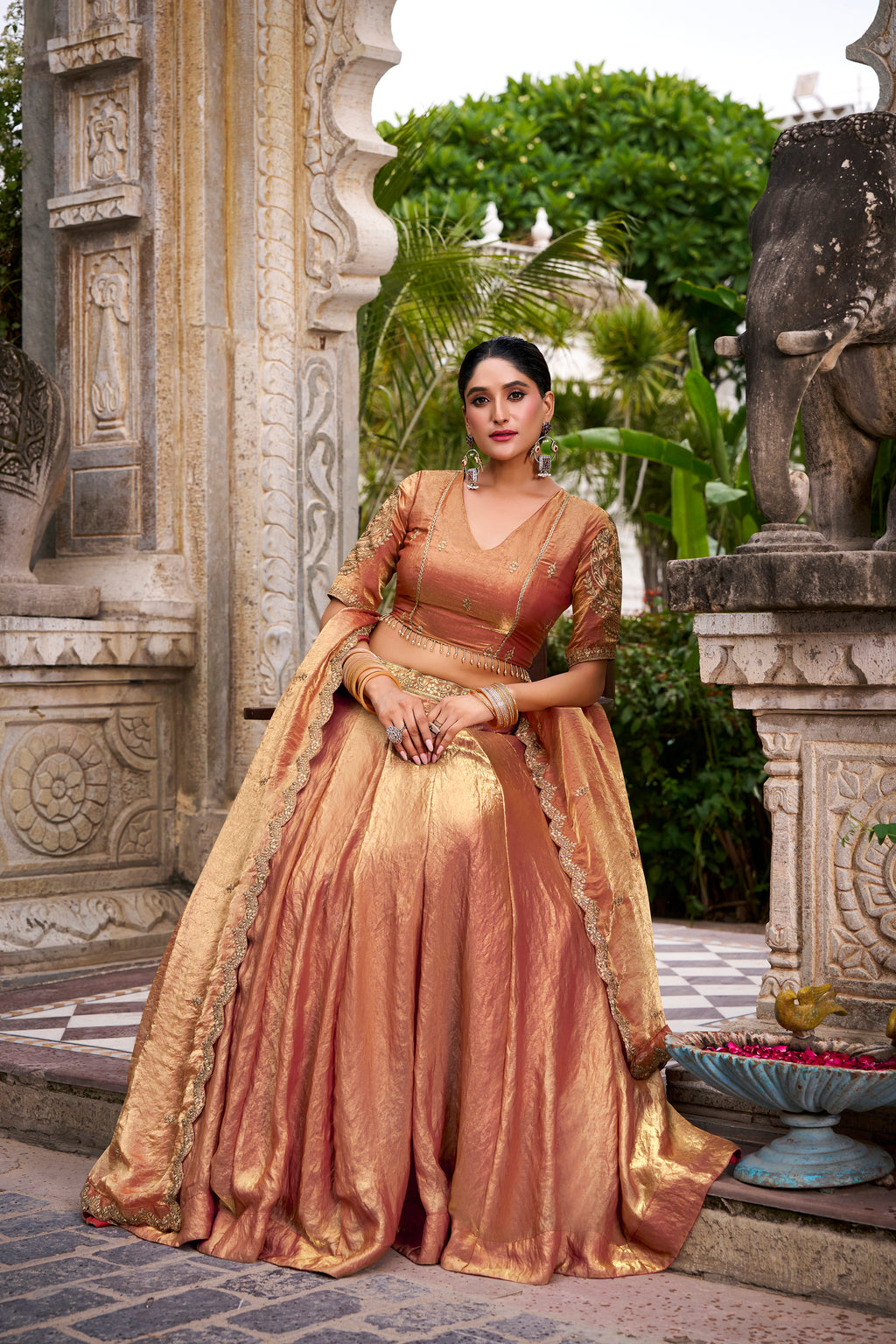 Designer Rose Gold Lehenga in Crushed Shimmer Fabric with an Embroidered