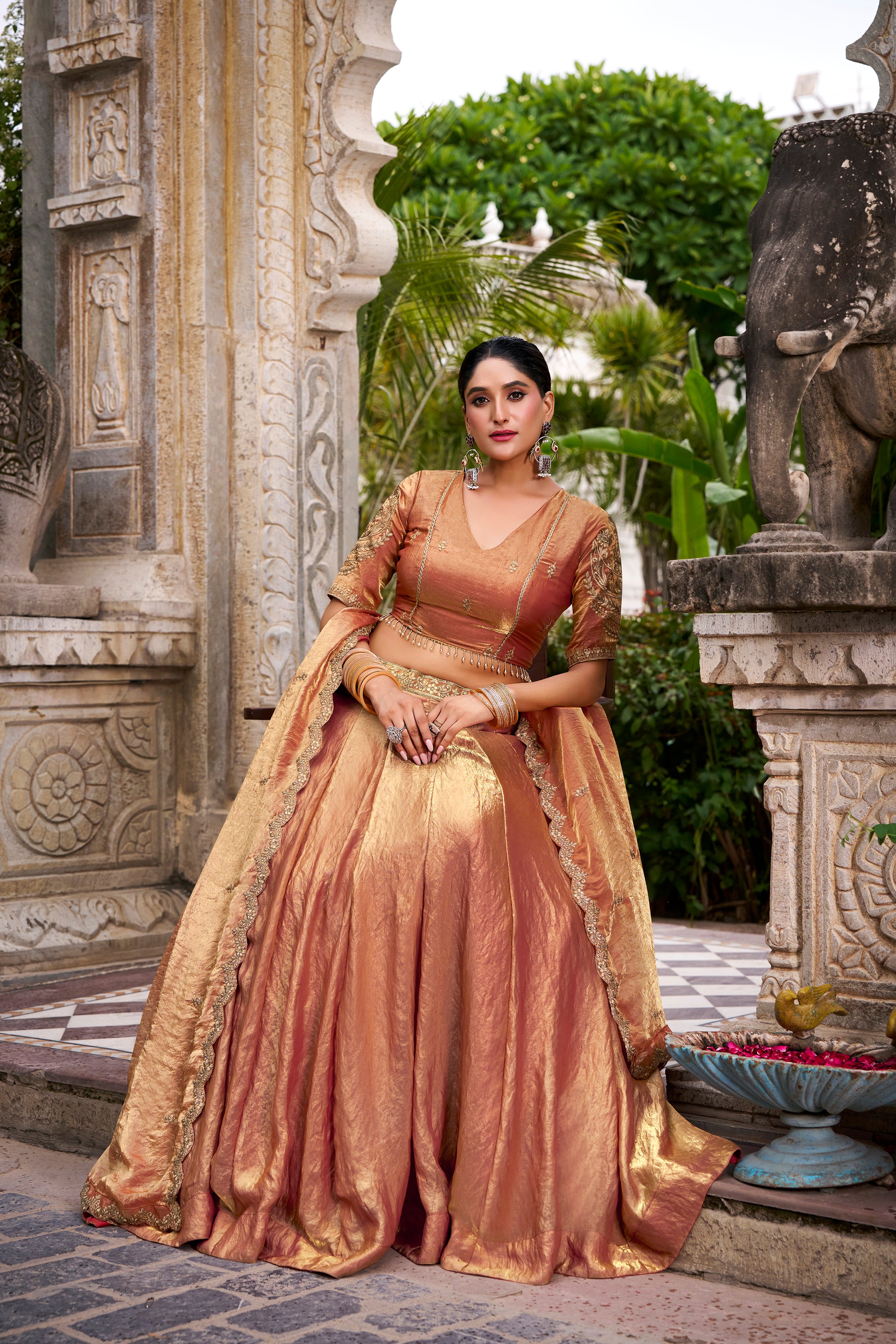 Designer Rose Gold Lehenga in Crushed Shimmer Fabric with an Embroidered