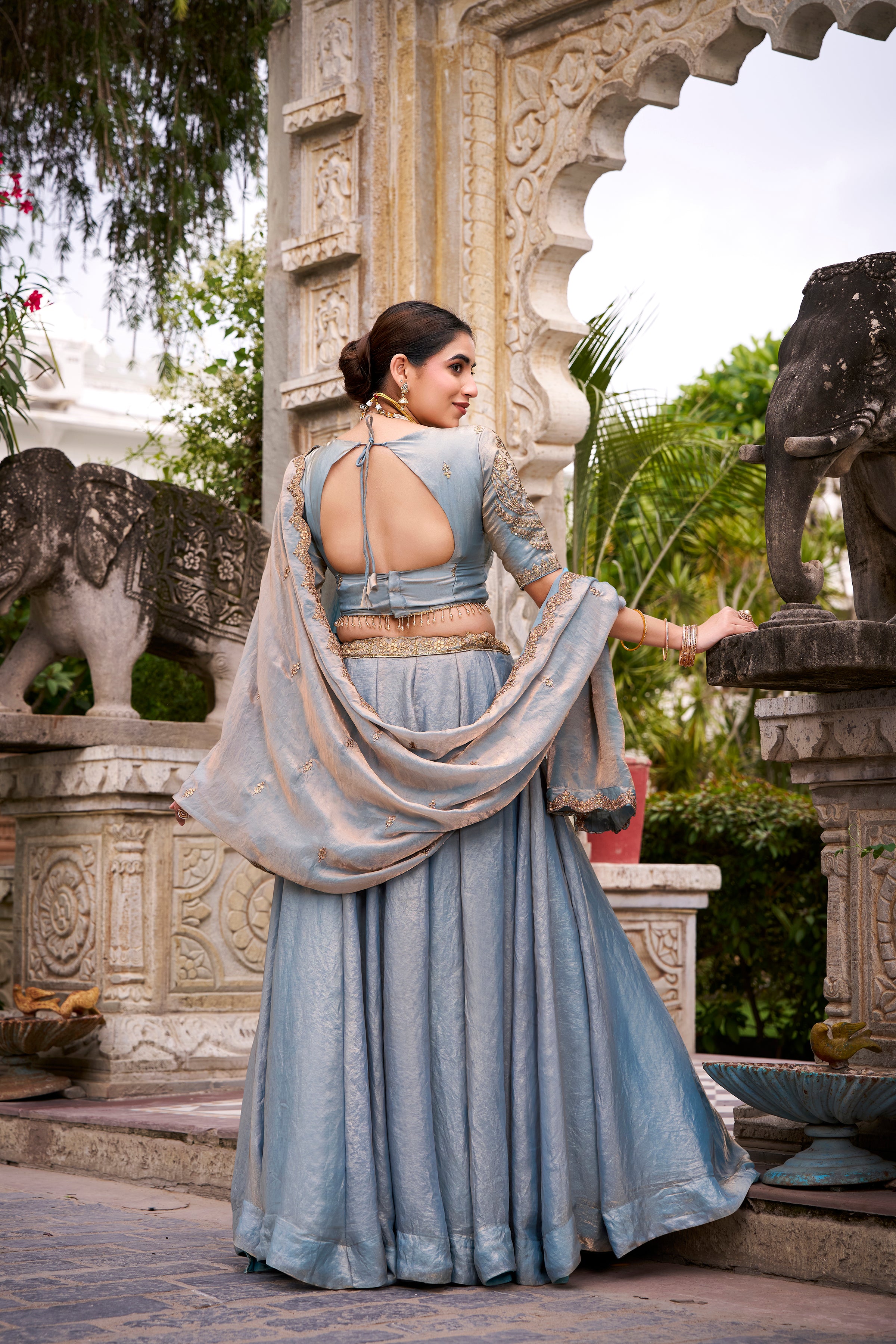 Designer Rose Gold Lehenga in Crushed Shimmer Fabric with an Embroidered