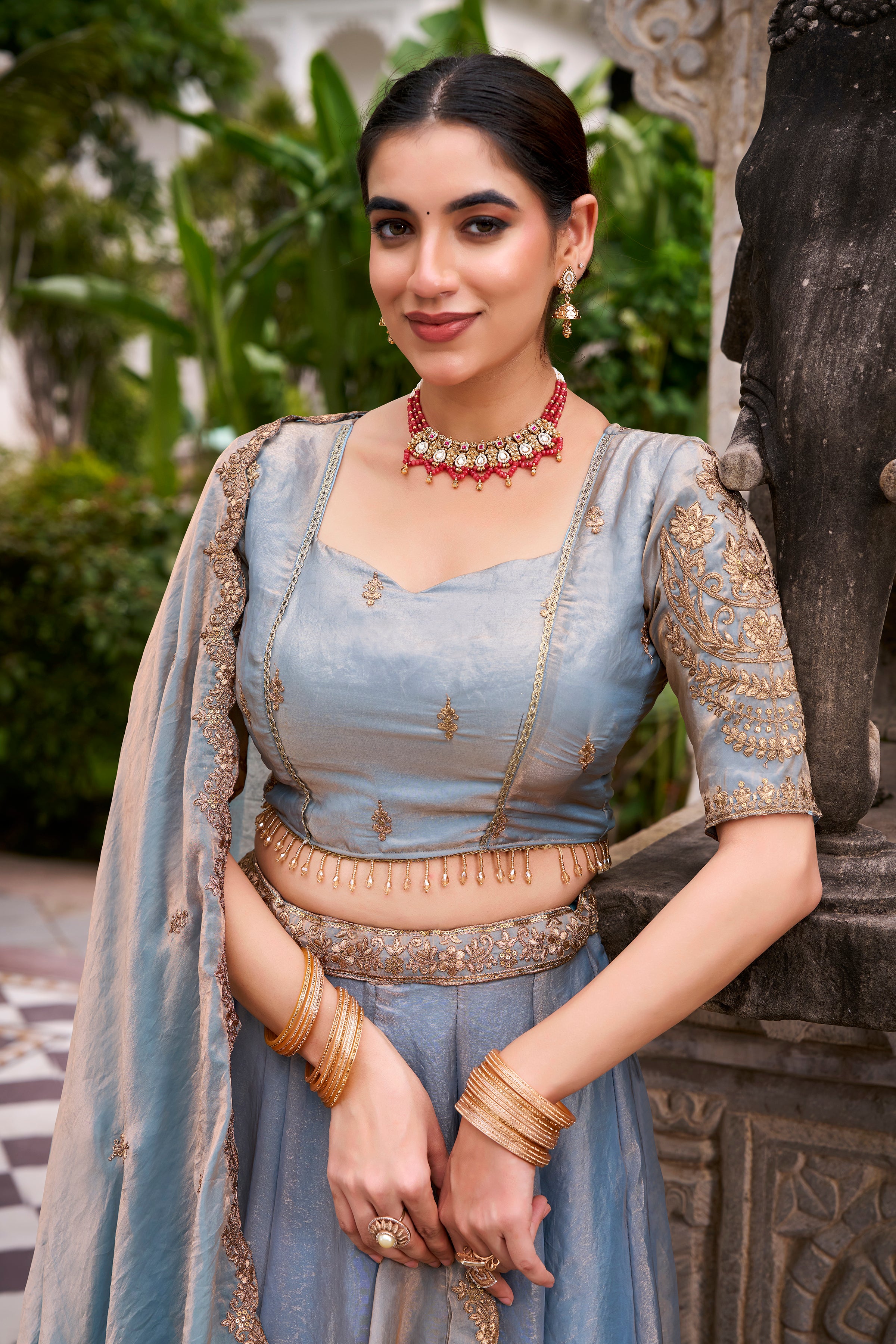 Designer Rose Gold Lehenga in Crushed Shimmer Fabric with an Embroidered