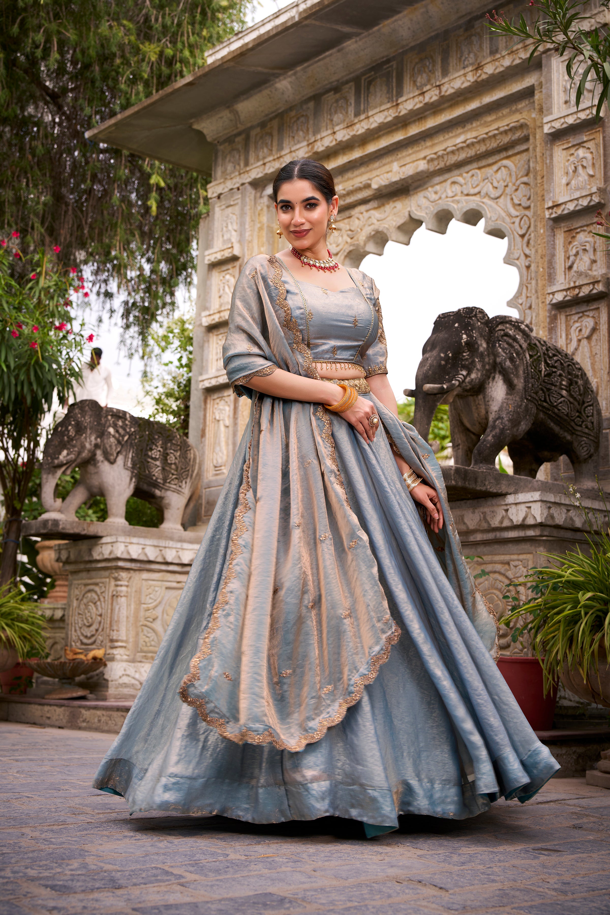 Designer Rose Gold Lehenga in Crushed Shimmer Fabric with an Embroidered