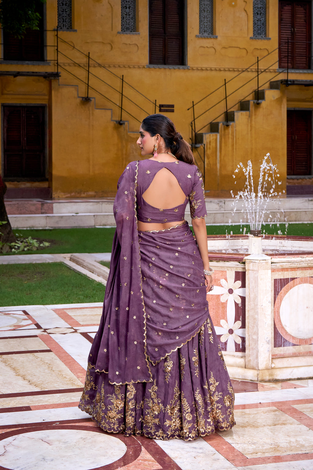 Regal Mauve Lehenga Choli with Golden Embroidery