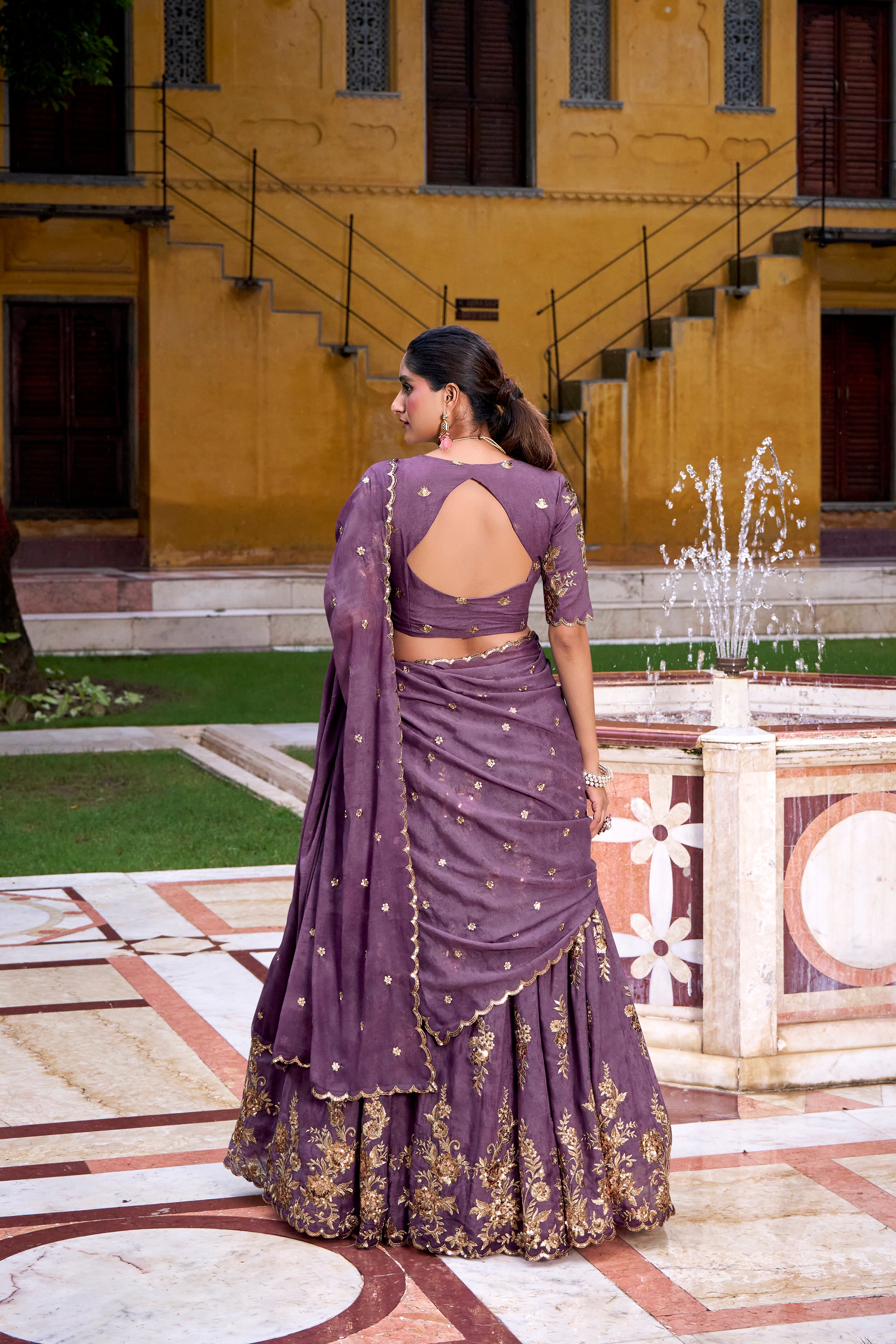 Regal Mauve Lehenga Choli with Golden Embroidery